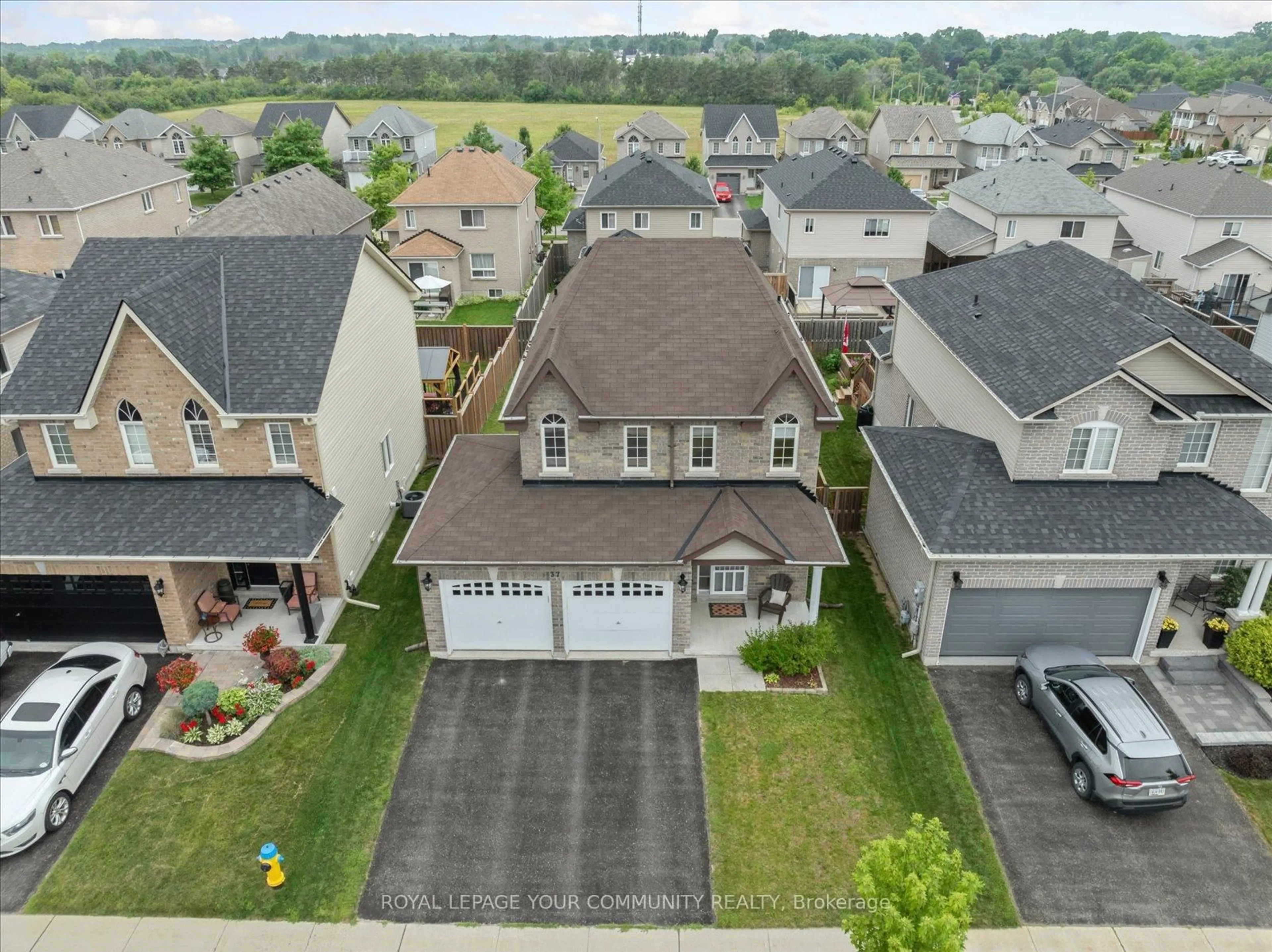 A pic from outside/outdoor area/front of a property/back of a property/a pic from drone, street for 37 Gunsolus Rd, Kawartha Lakes Ontario K9V 0E4