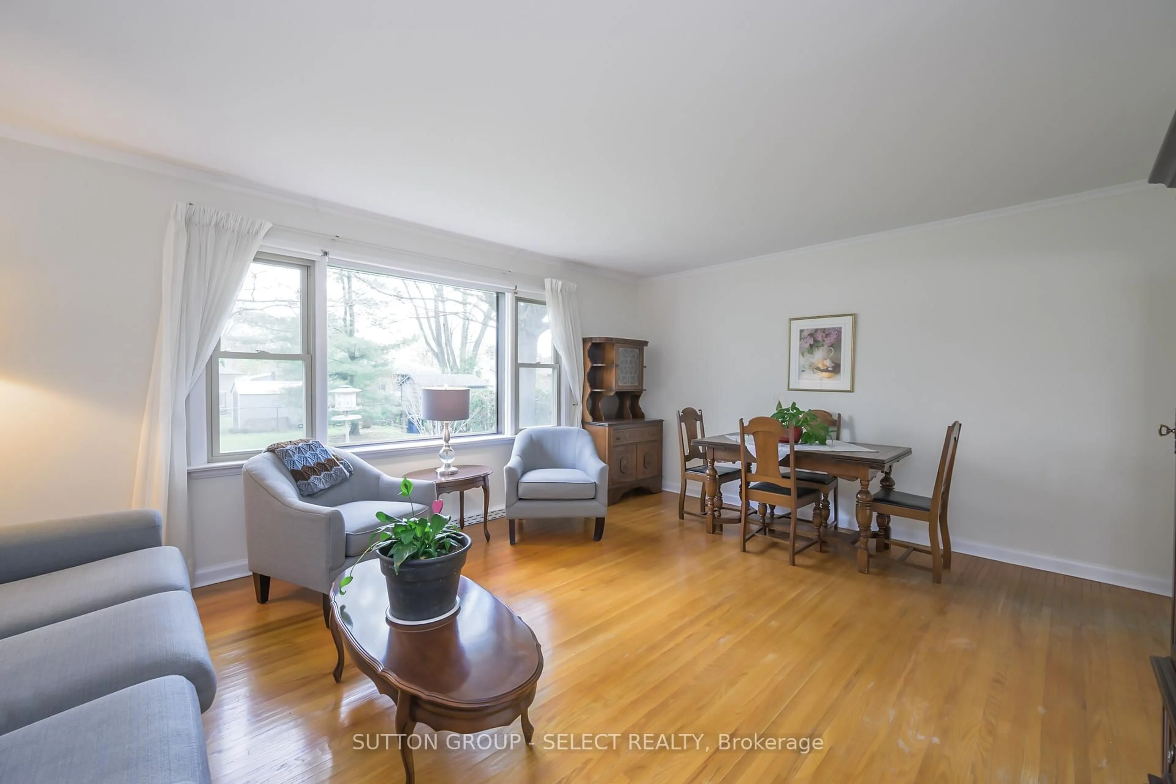 Living room with furniture, wood/laminate floor for 304 BLOXAM Ave, London South Ontario N6J 3K6