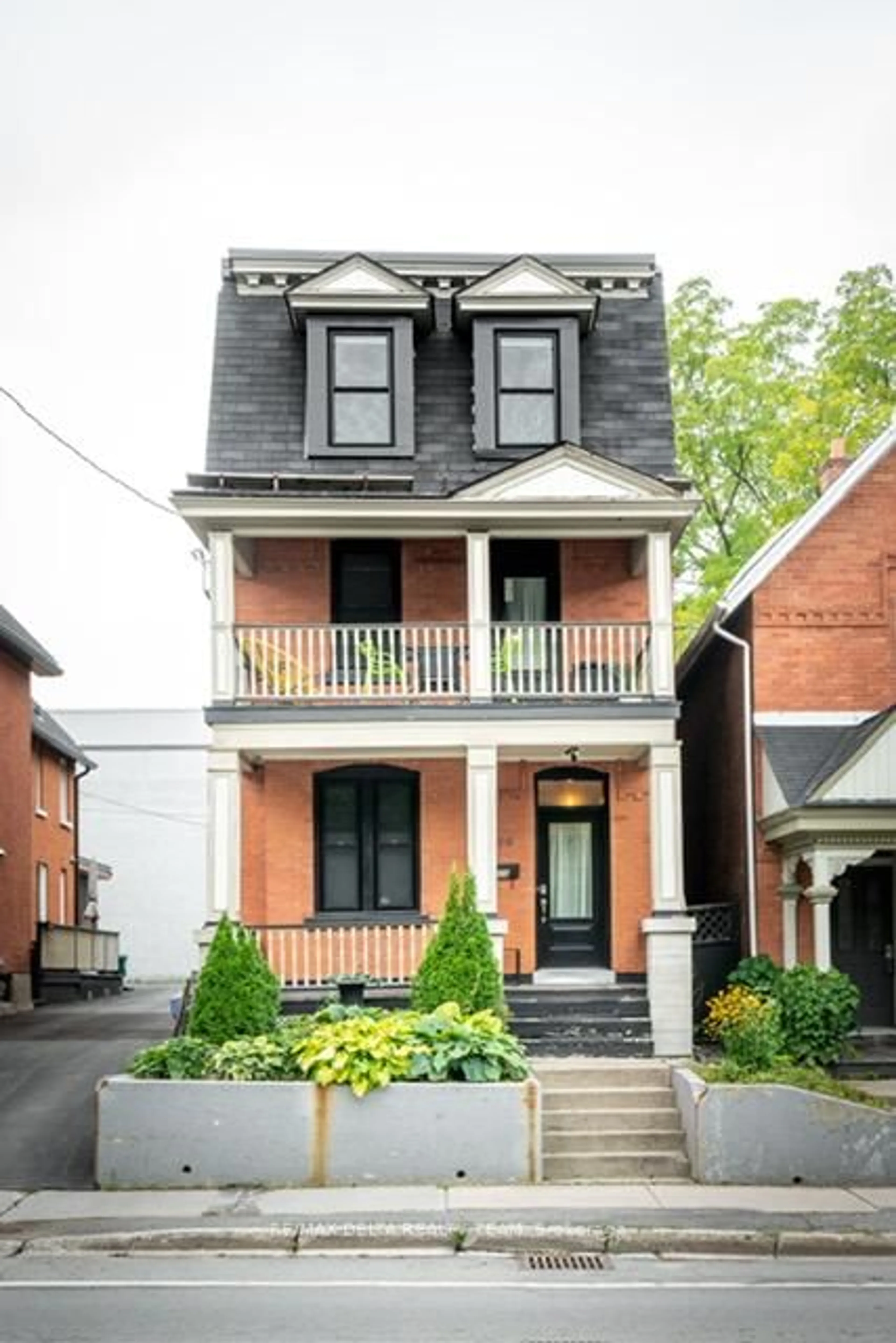 Home with brick exterior material, street for 320 Lyon St, Ottawa Ontario K1R 5W6