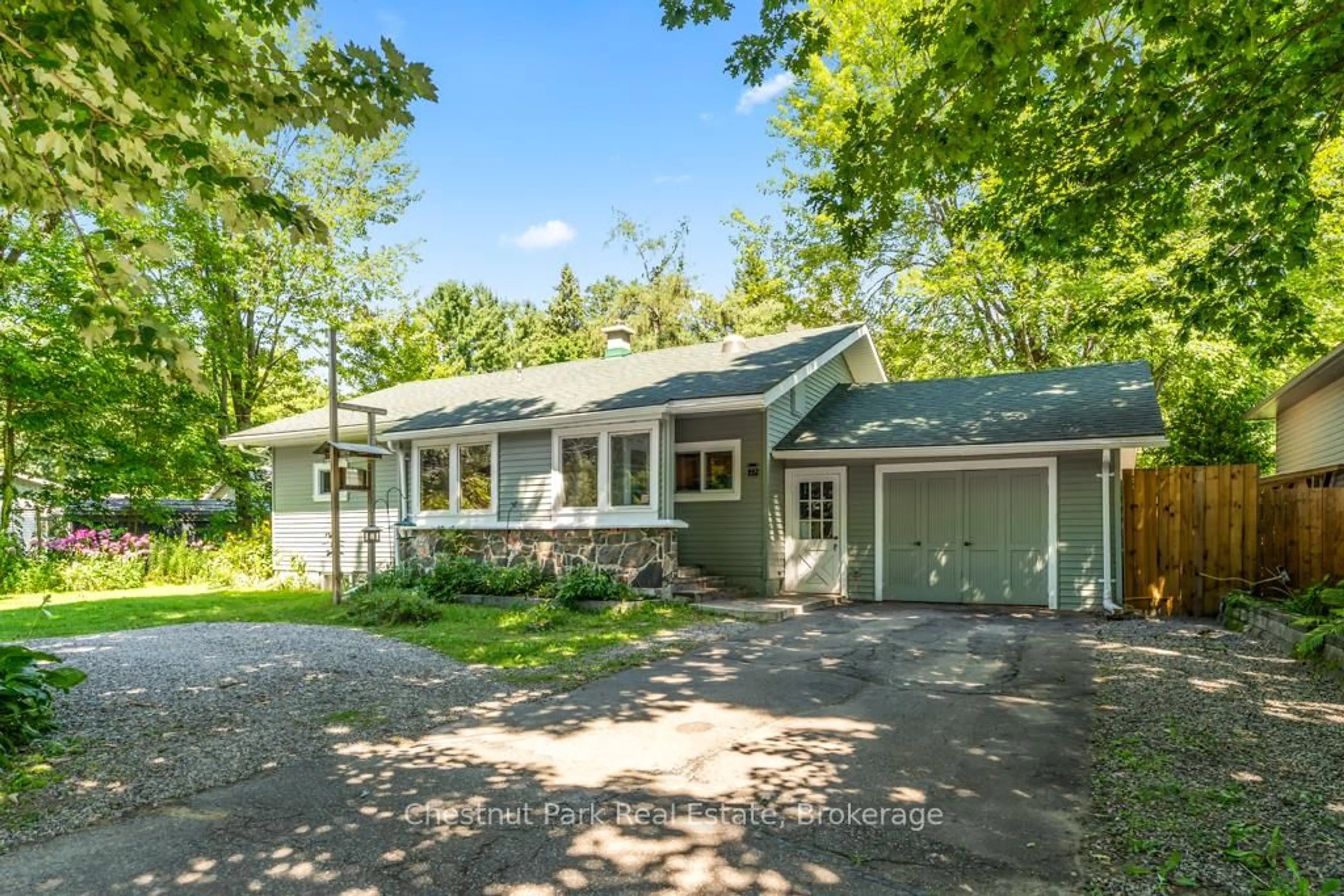 Home with vinyl exterior material, street for 23 EWING St, Bracebridge Ontario P1L 1C7