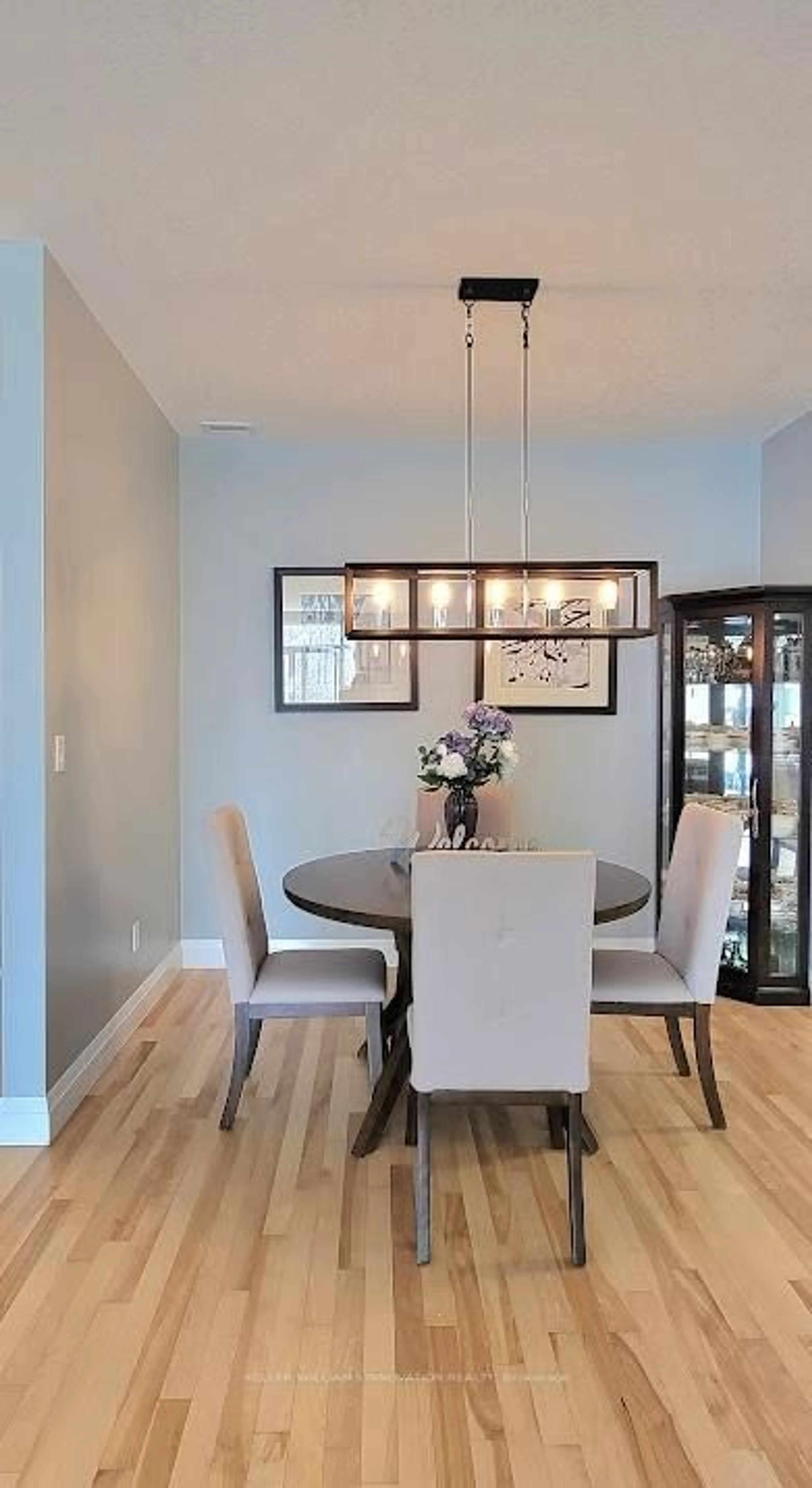Dining room, wood/laminate floor for 165 Duke St #210, Kitchener Ontario N2H 6T8