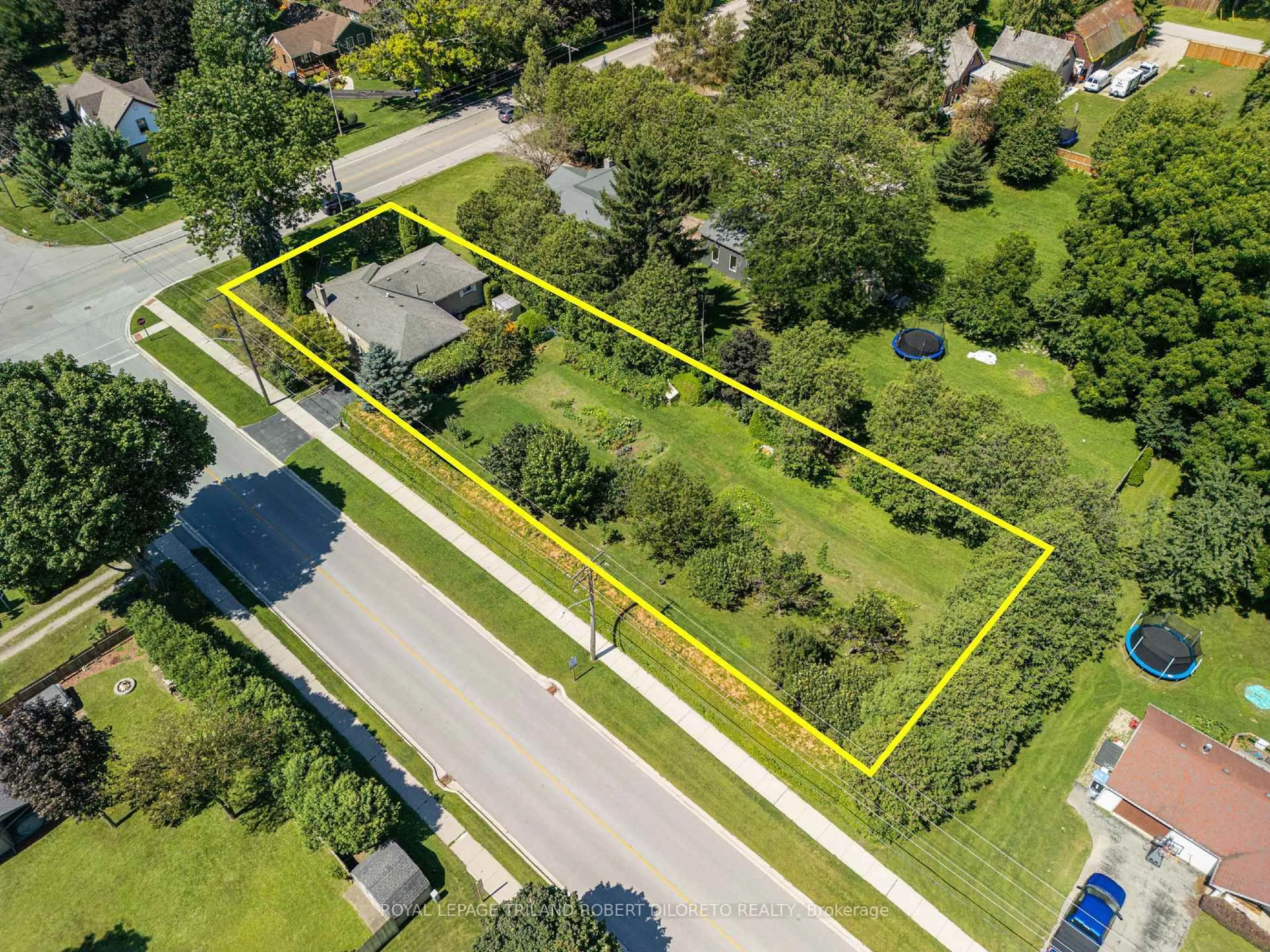 A pic from outside/outdoor area/front of a property/back of a property/a pic from drone, street for 22756 KOMOKA Rd, Middlesex Centre Ontario N0L 1R0