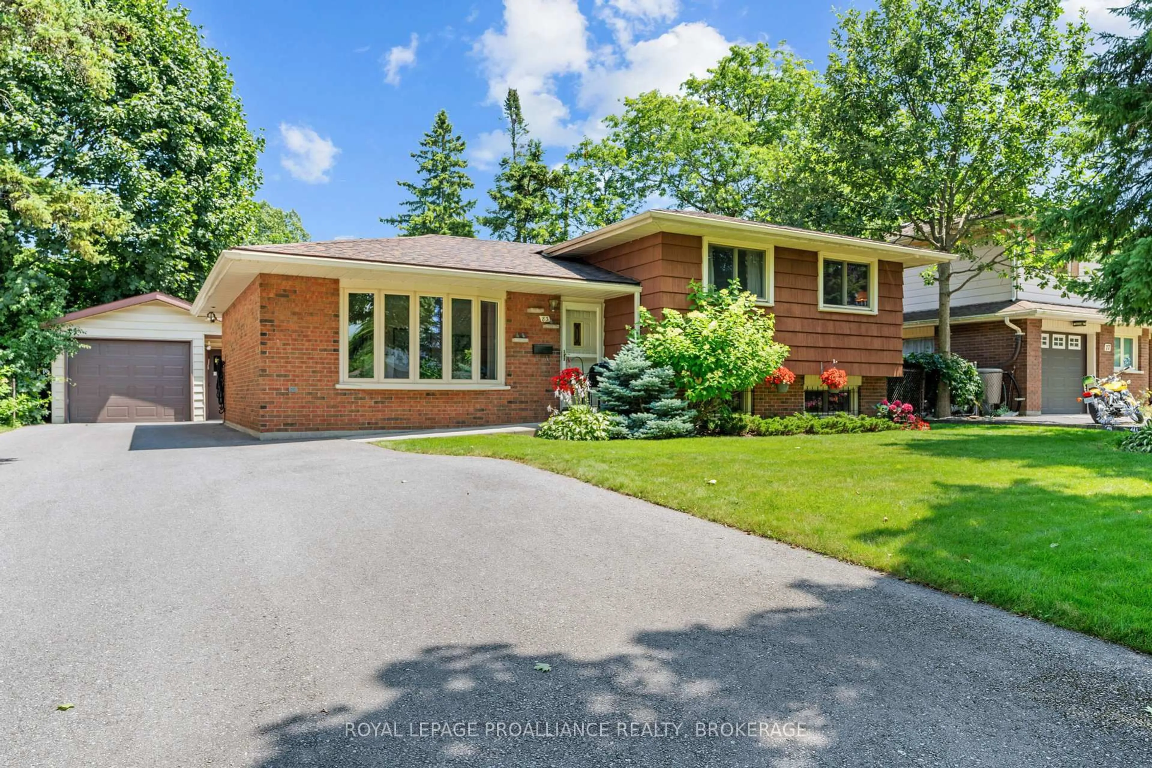 Home with brick exterior material, street for 83 QUEEN MARY Rd, Kingston Ontario K7M 2A3