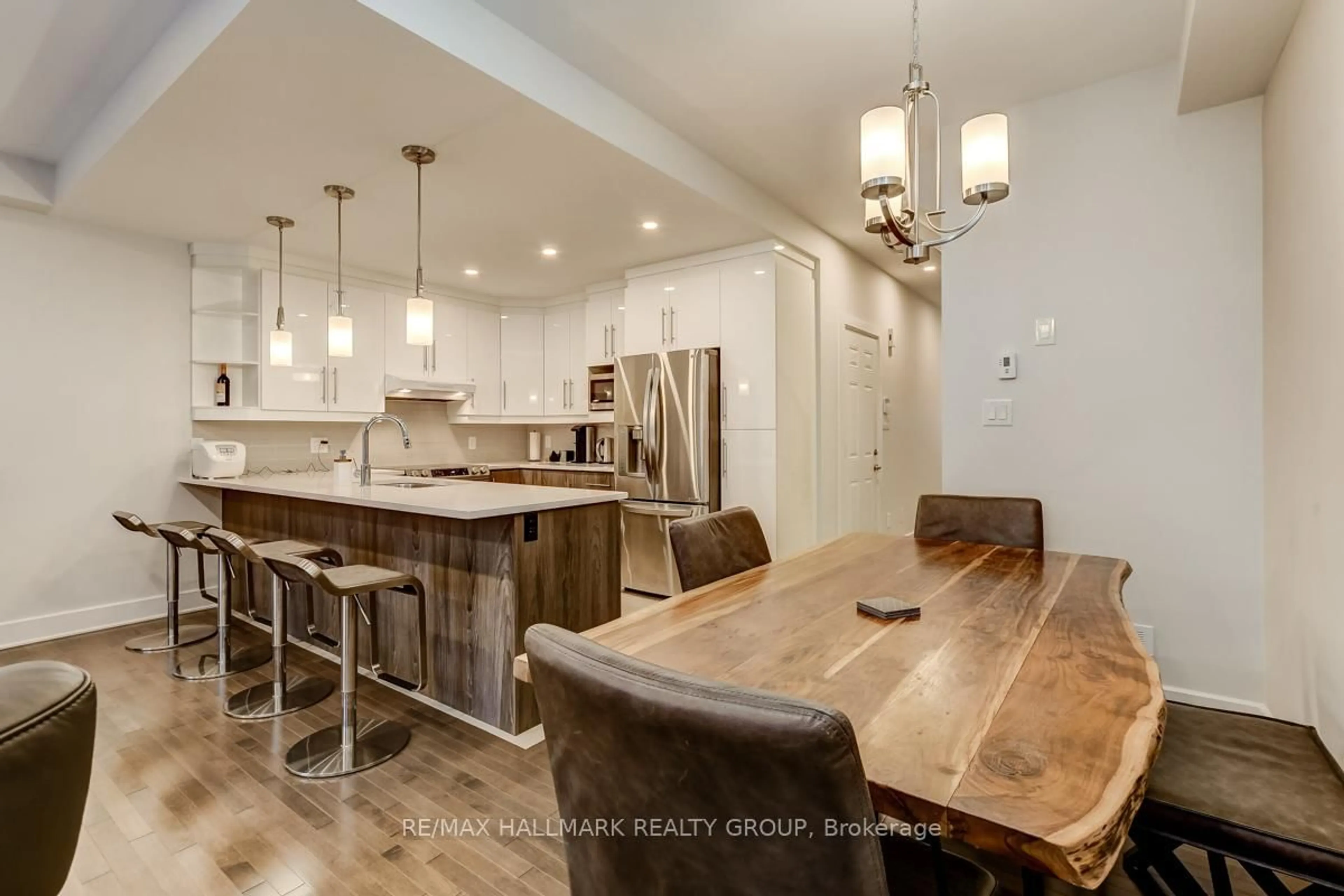Open concept kitchen, wood/laminate floor for 1006 Shefford Rd, Ottawa Ontario K1J 6X5