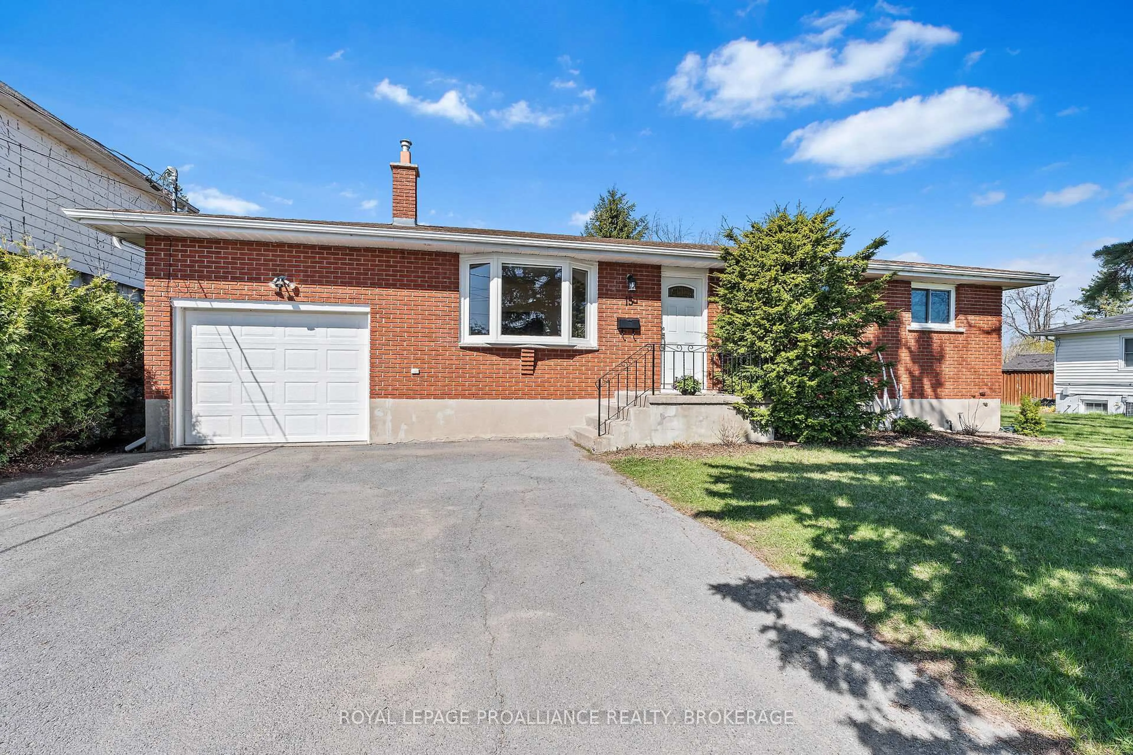 Home with brick exterior material, street for 15 Sunny Acres Rd, Kingston Ontario K7M 3N3