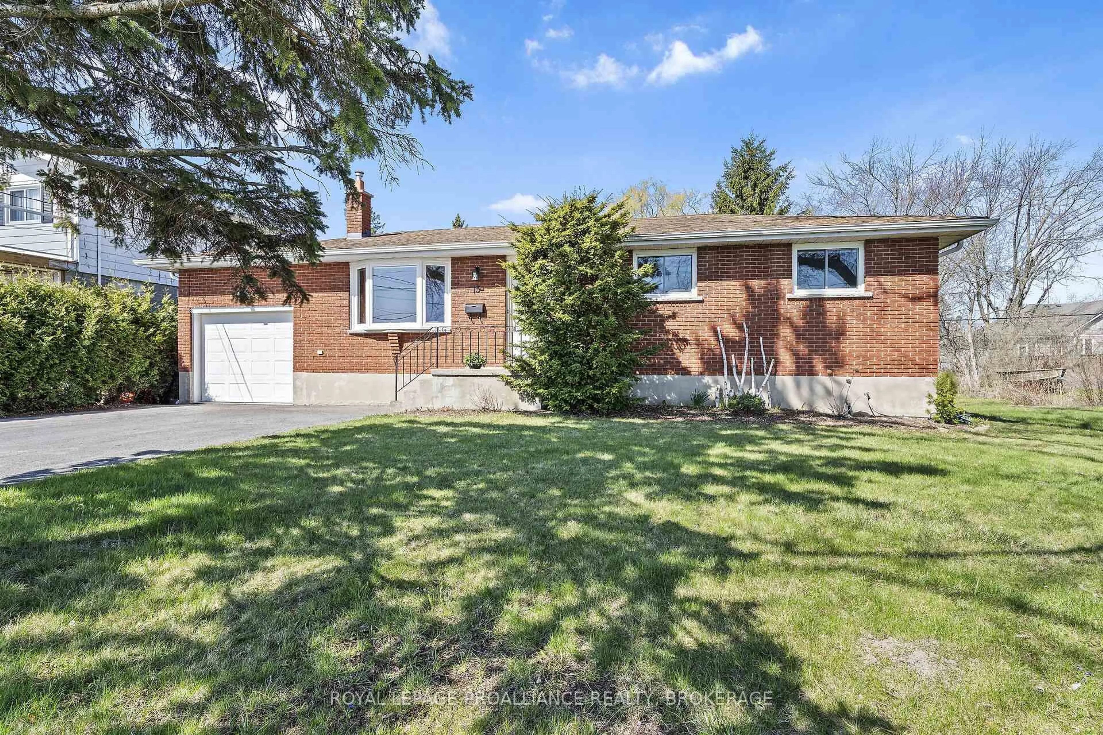 Home with brick exterior material, street for 15 Sunny Acres Rd, Kingston Ontario K7M 3N3