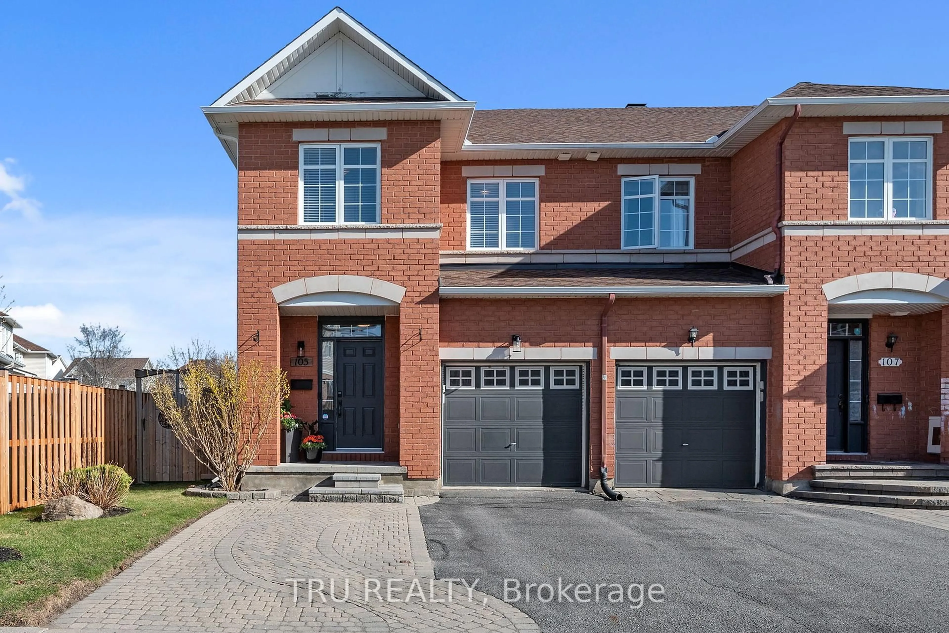 Home with brick exterior material, street for 105 Deercroft Ave, Ottawa Ontario K2J 5H7