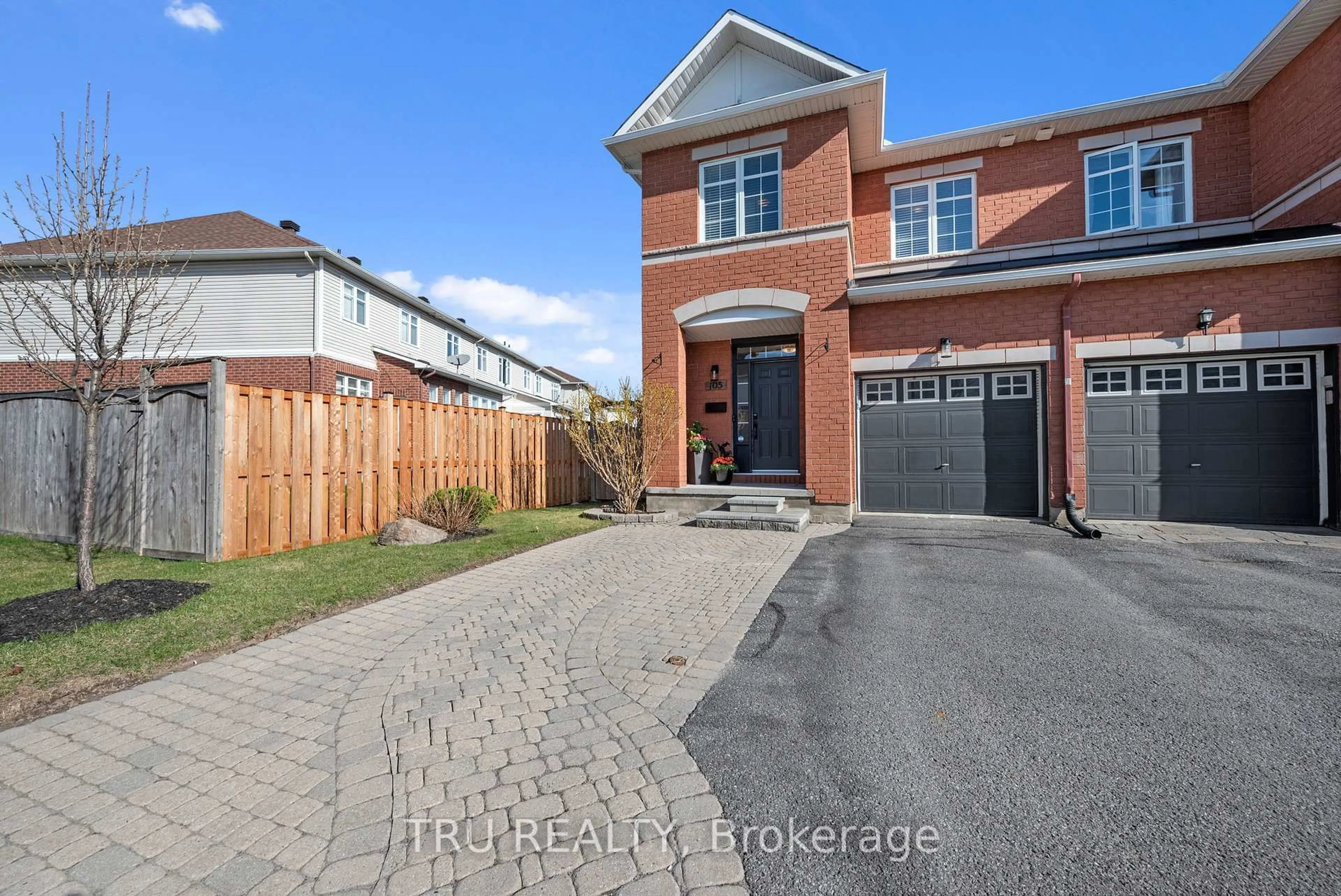 Home with brick exterior material, street for 105 Deercroft Ave, Ottawa Ontario K2J 5H7