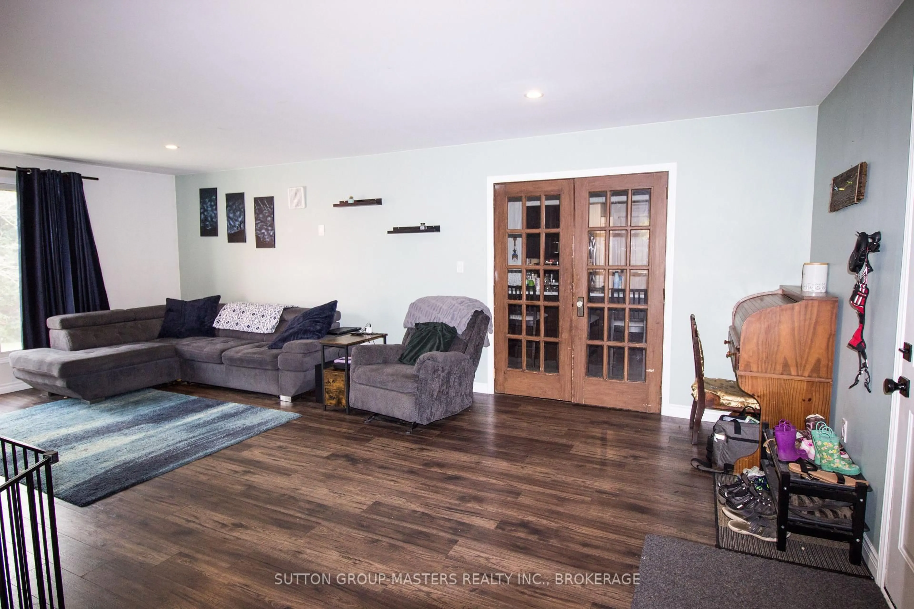 Living room with furniture, wood/laminate floor for 6449 HIGHWAY 38 N/A, Kaladar Ontario K0K 1Z0