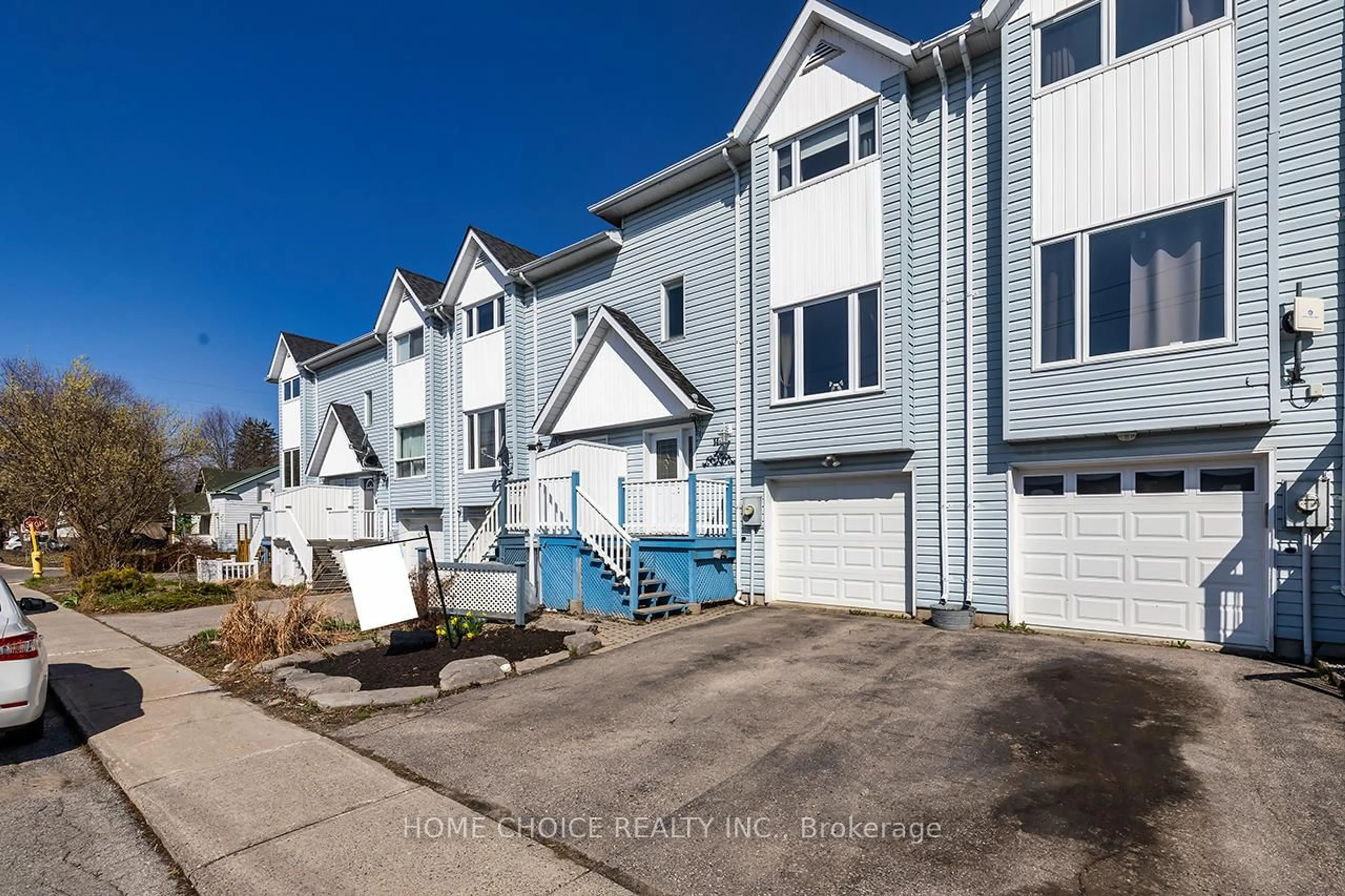 A pic from outside/outdoor area/front of a property/back of a property/a pic from drone, street for 14 GROSS St #D, Brighton Ontario K0K 1H0