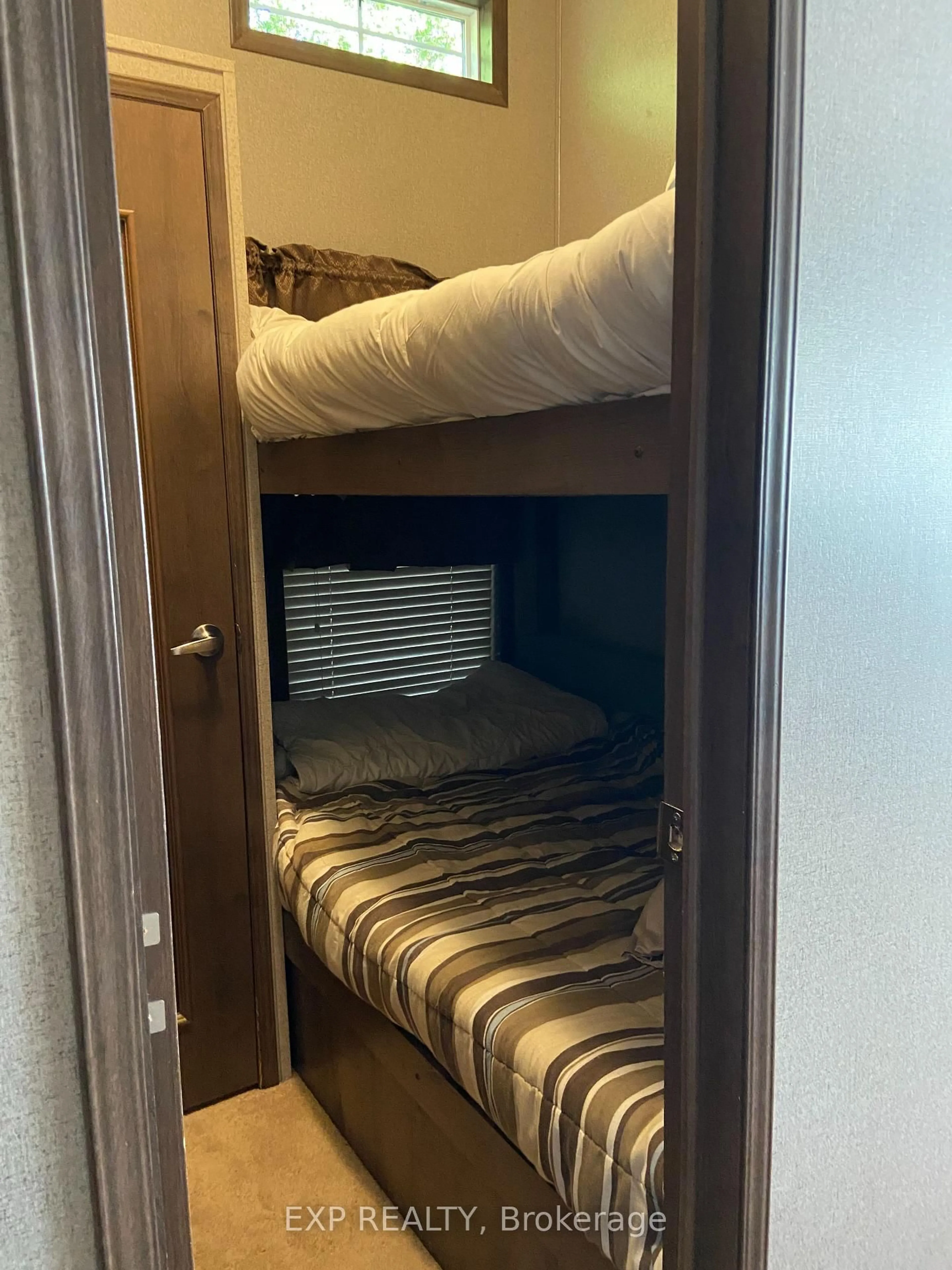 Bedroom with bed, floor is not visible for 76735 Wildwood Line #232, Bluewater Ontario N0M 1G0