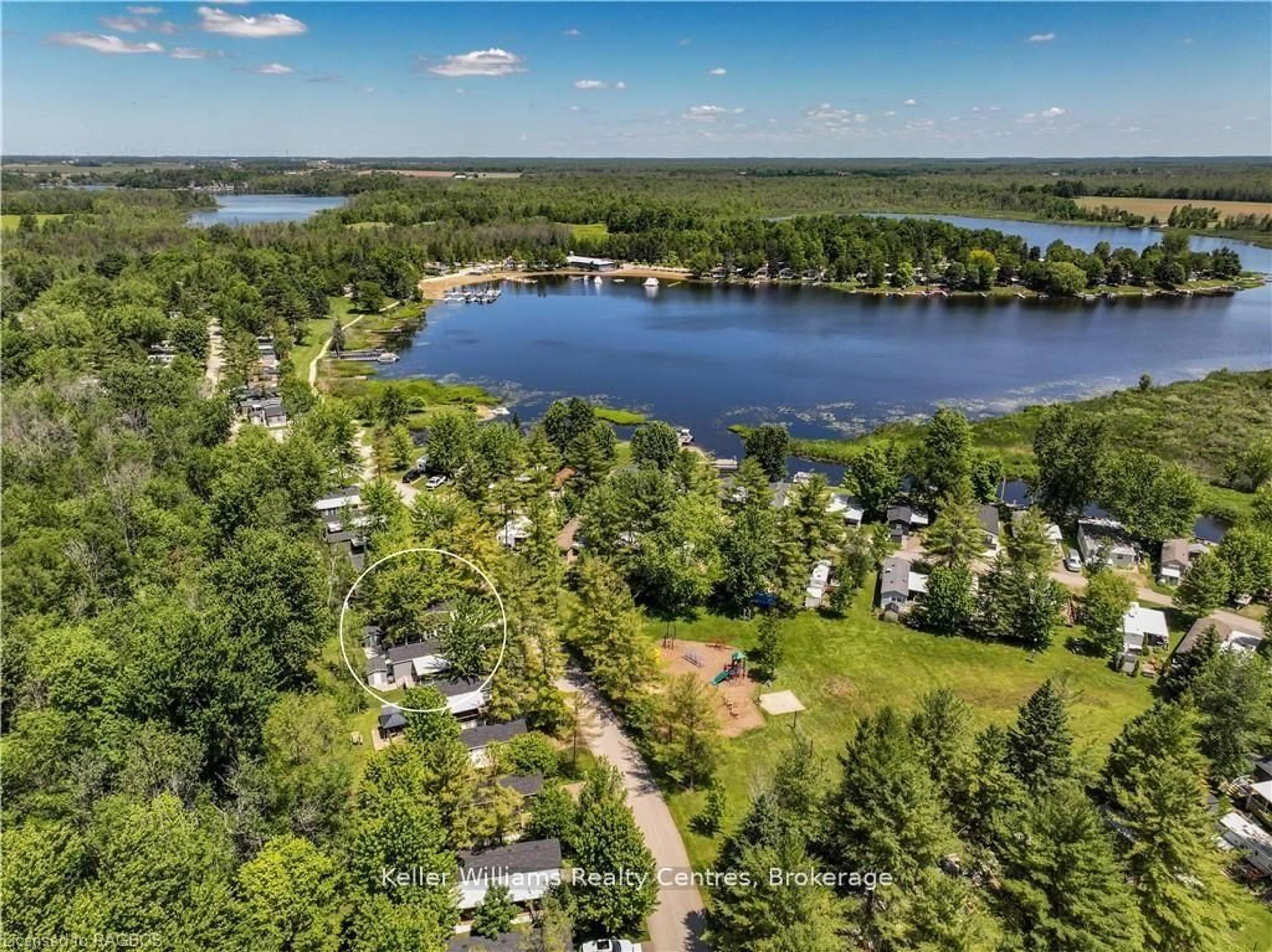 A pic from outside/outdoor area/front of a property/back of a property/a pic from drone, water/lake/river/ocean view for 13 Southline Ave #157, Huron-Kinloss Ontario N2Z 2X5