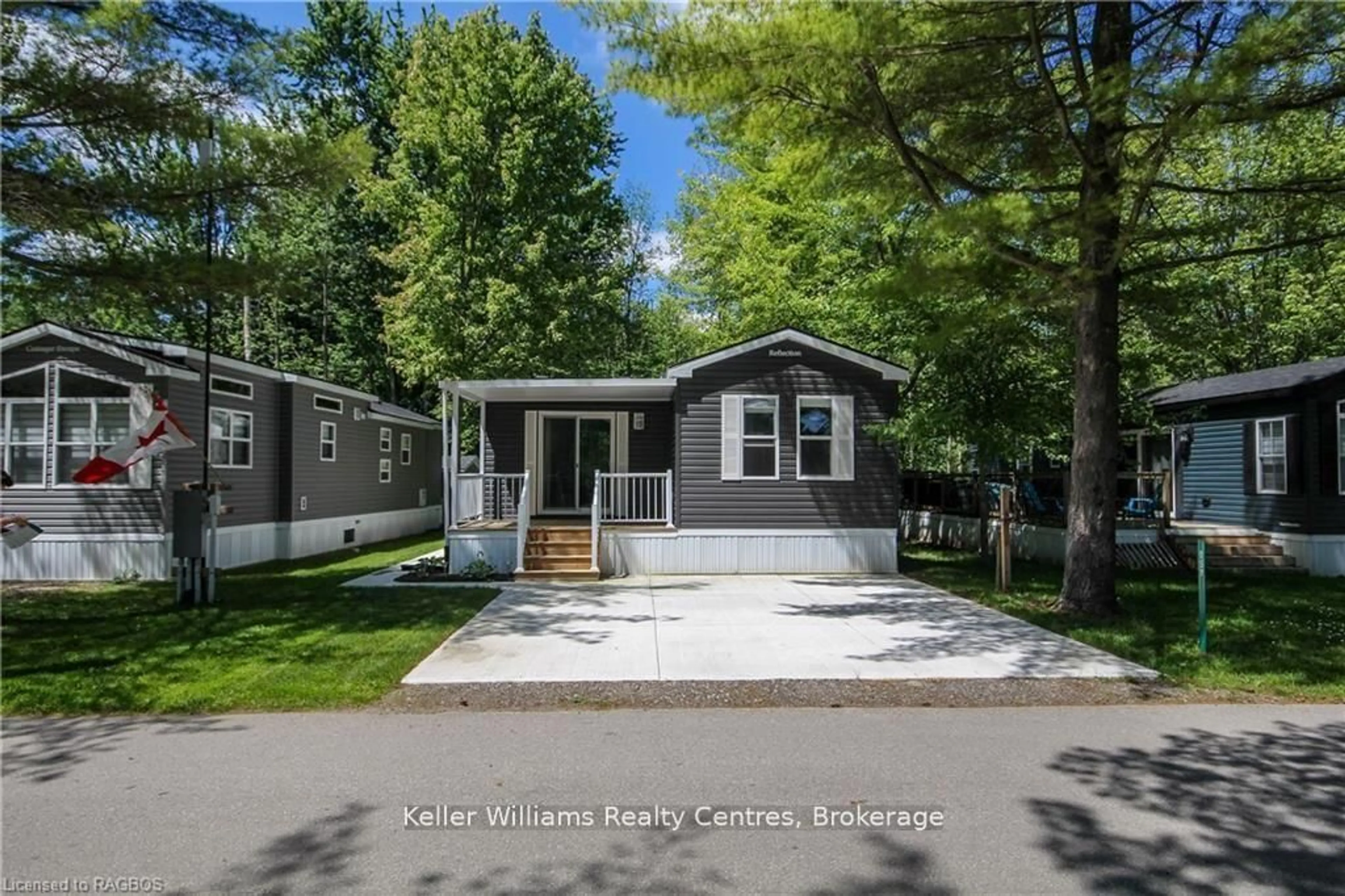 Home with vinyl exterior material, street for 13 Southline #157 Ave, Huron-Kinloss Ontario N2Z 2X5