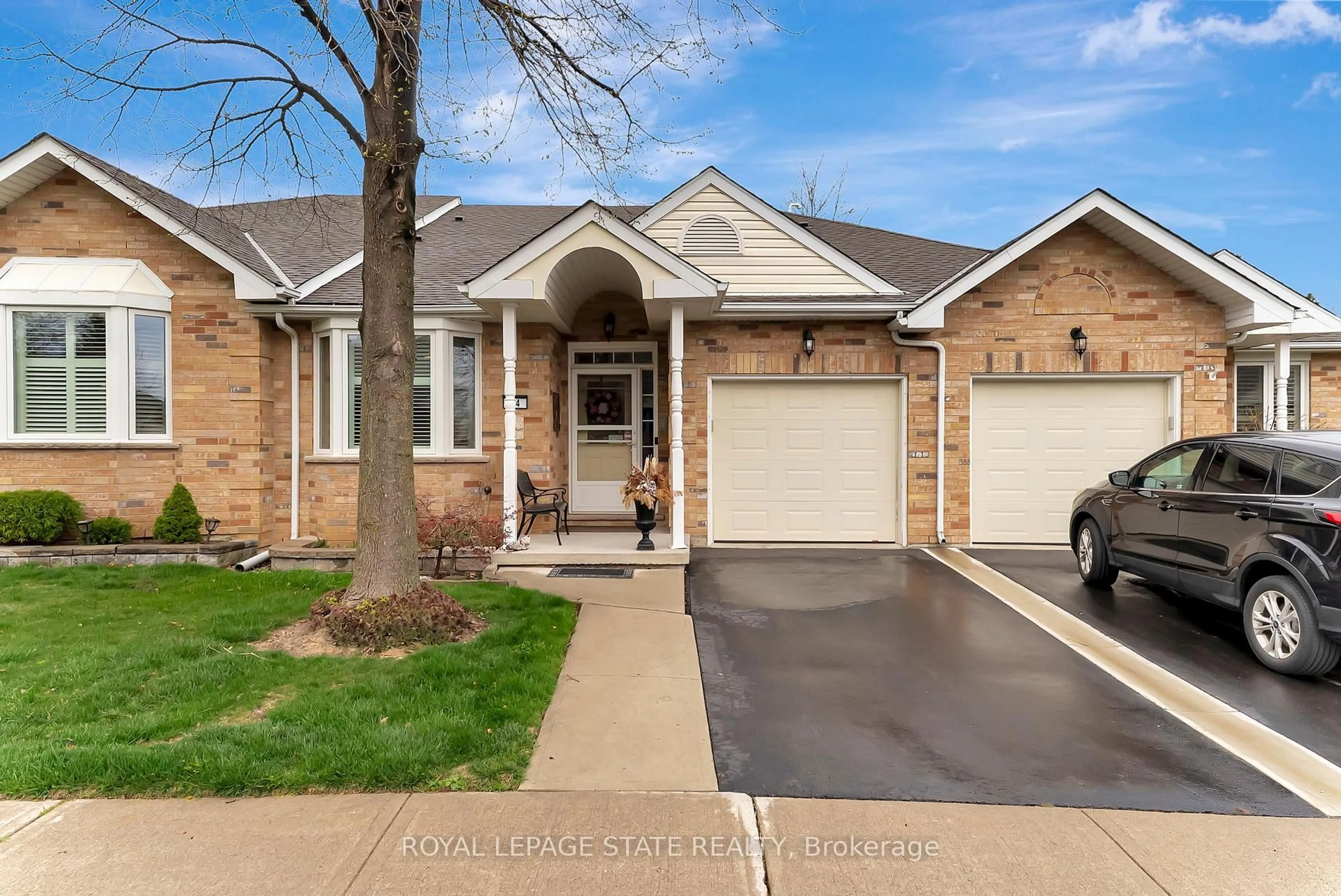 Home with brick exterior material, street for 94 Sandollar Dr, Hamilton Ontario L0R 1W0