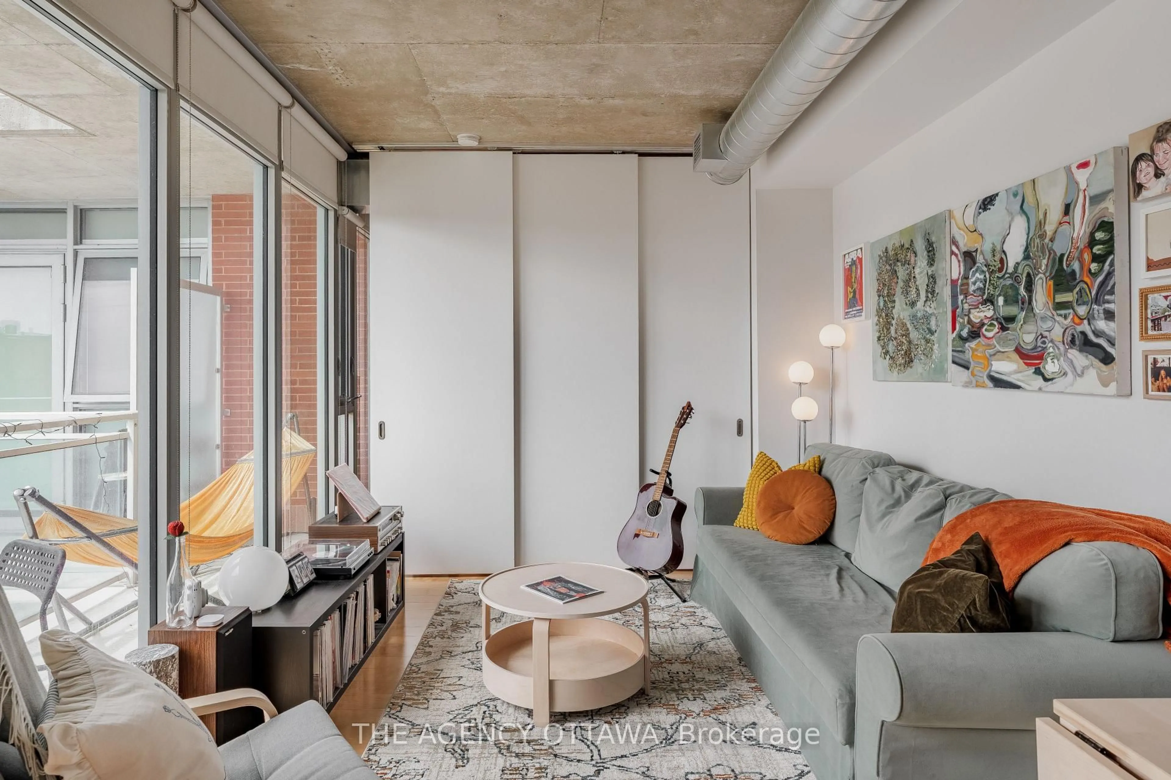 Living room with furniture, cement floor for 340 Mcleod St #550, Ottawa Ontario K2P 1A4
