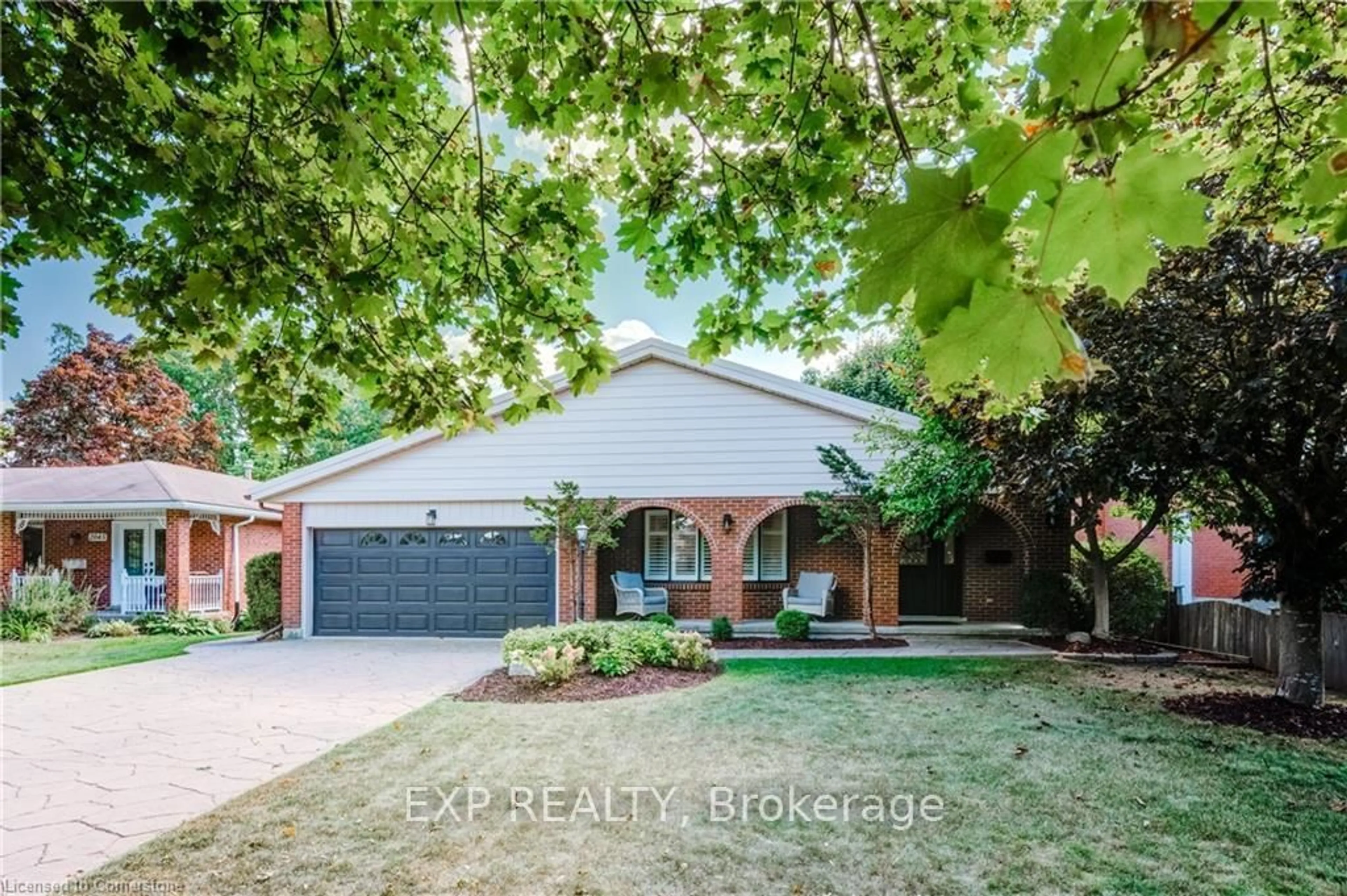 Home with brick exterior material, street for 2035 Old Mill Rd, Kitchener Ontario N2P 1E4