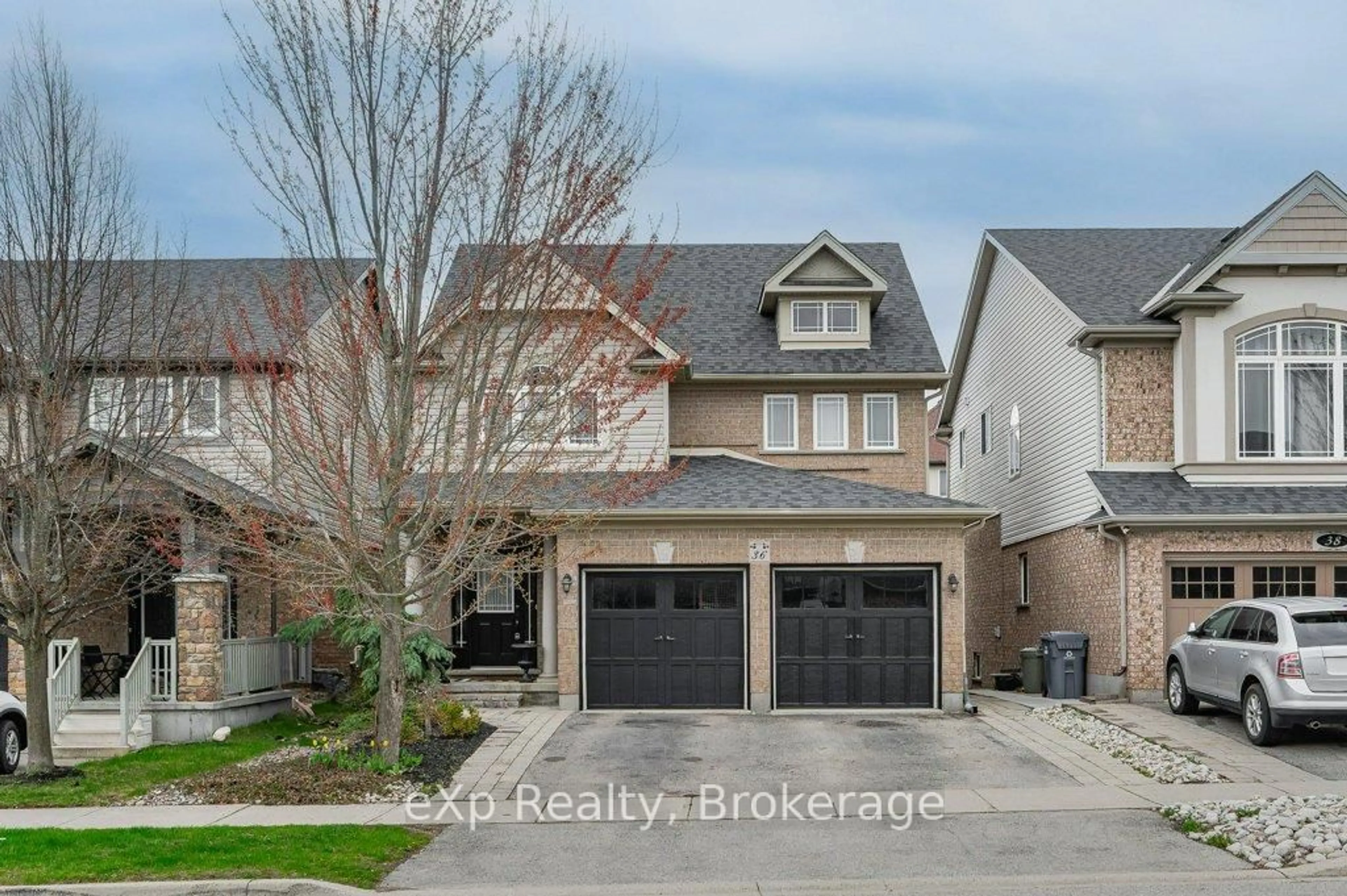 A pic from outside/outdoor area/front of a property/back of a property/a pic from drone, street for 36 Ray Cres, Guelph Ontario N1L 0B6