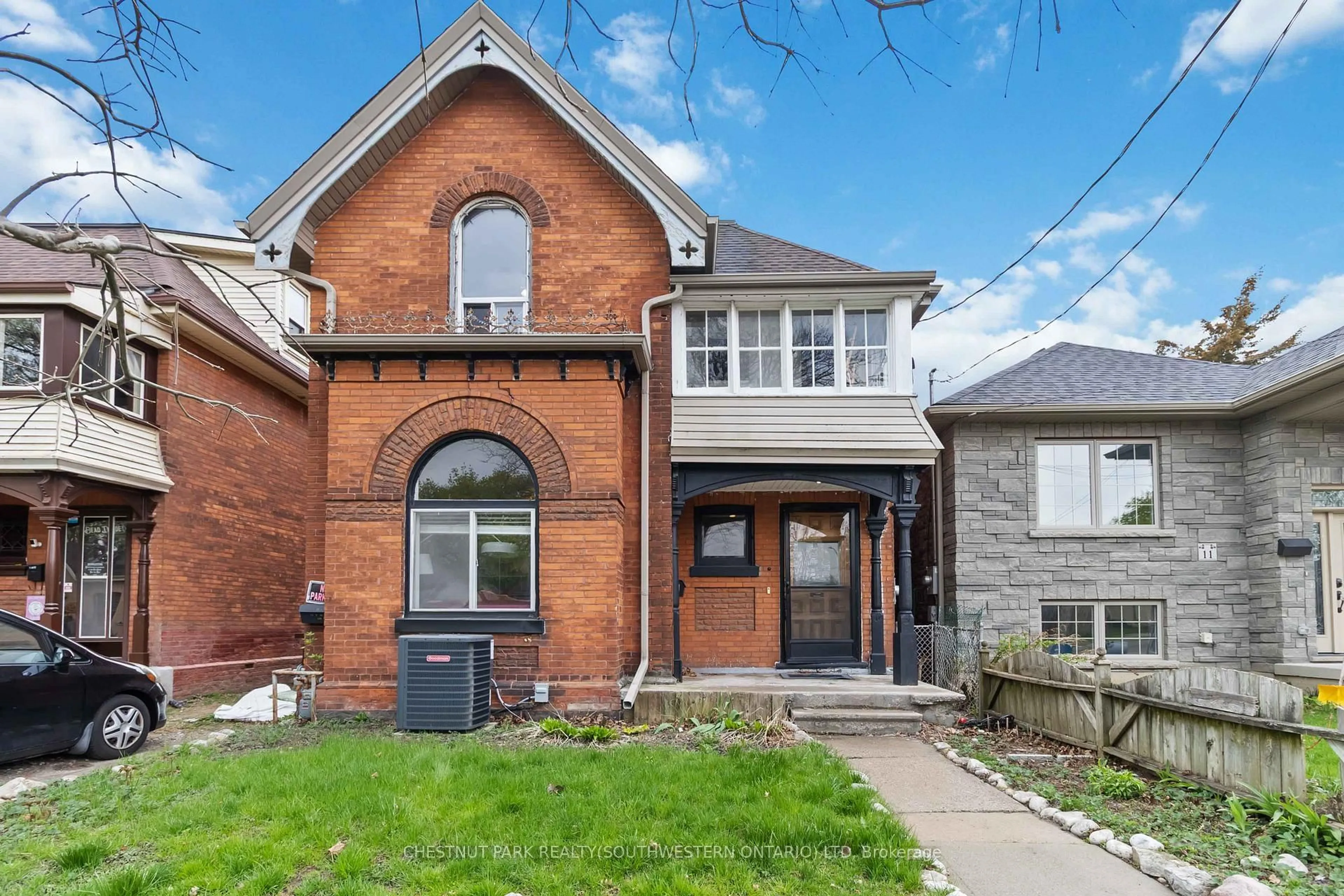 Home with brick exterior material, street for 13 Sarah St, Brantford Ontario N3S 2Z5