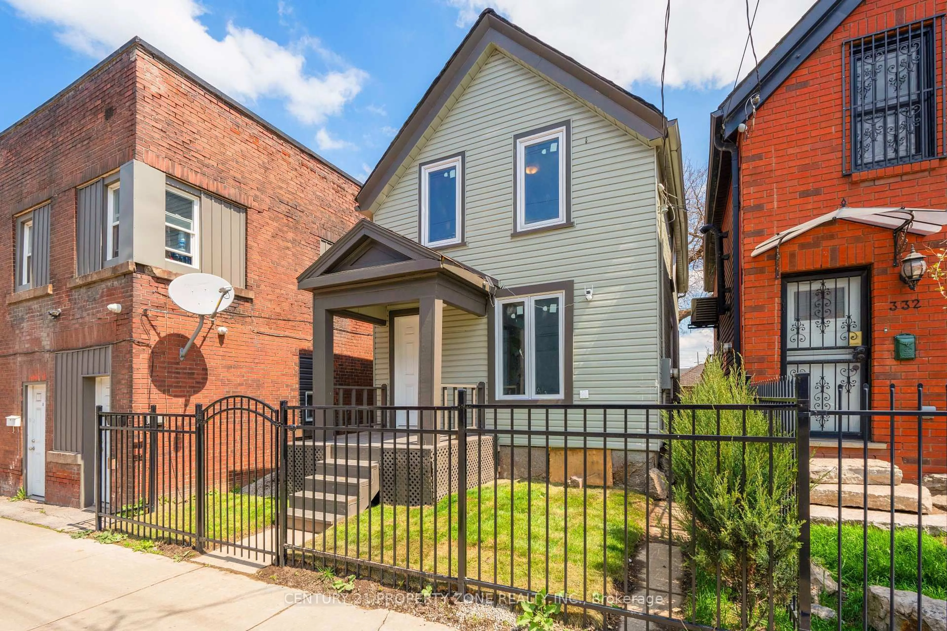 Home with brick exterior material, street for 334 Gage Ave, Hamilton Ontario L8L 7A7