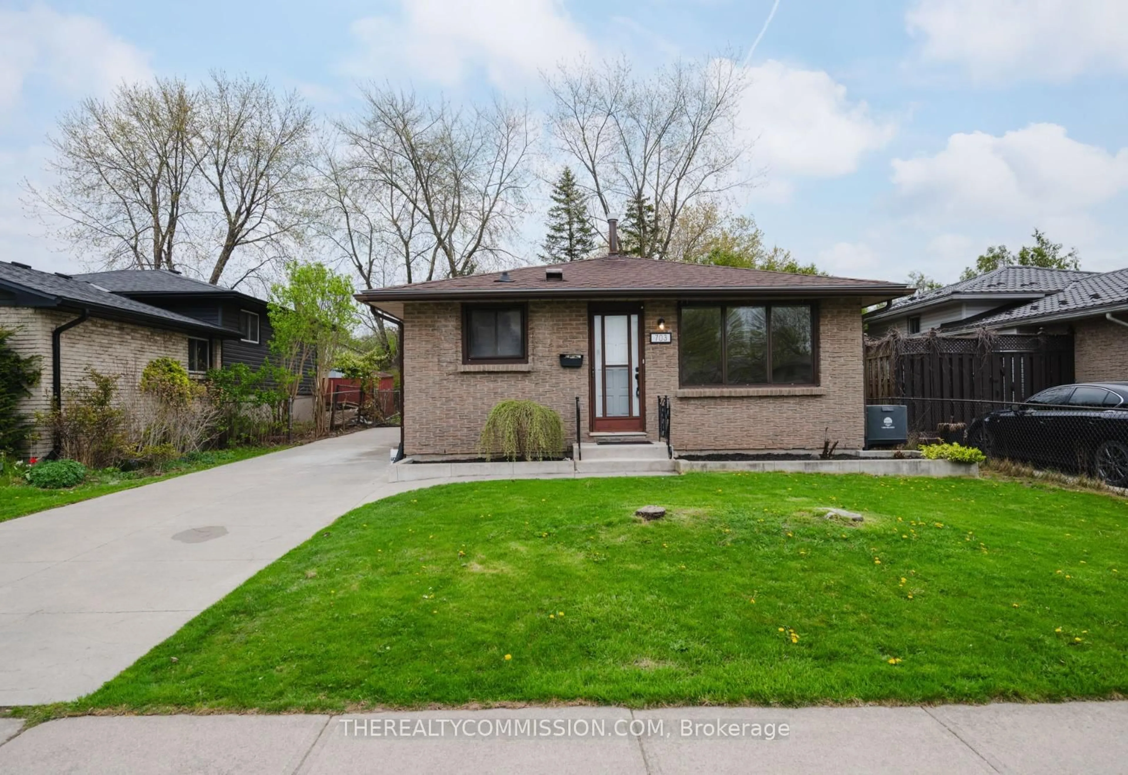 Home with brick exterior material, street for 703 Millbank Dr, London South Ontario N6E 1Y7