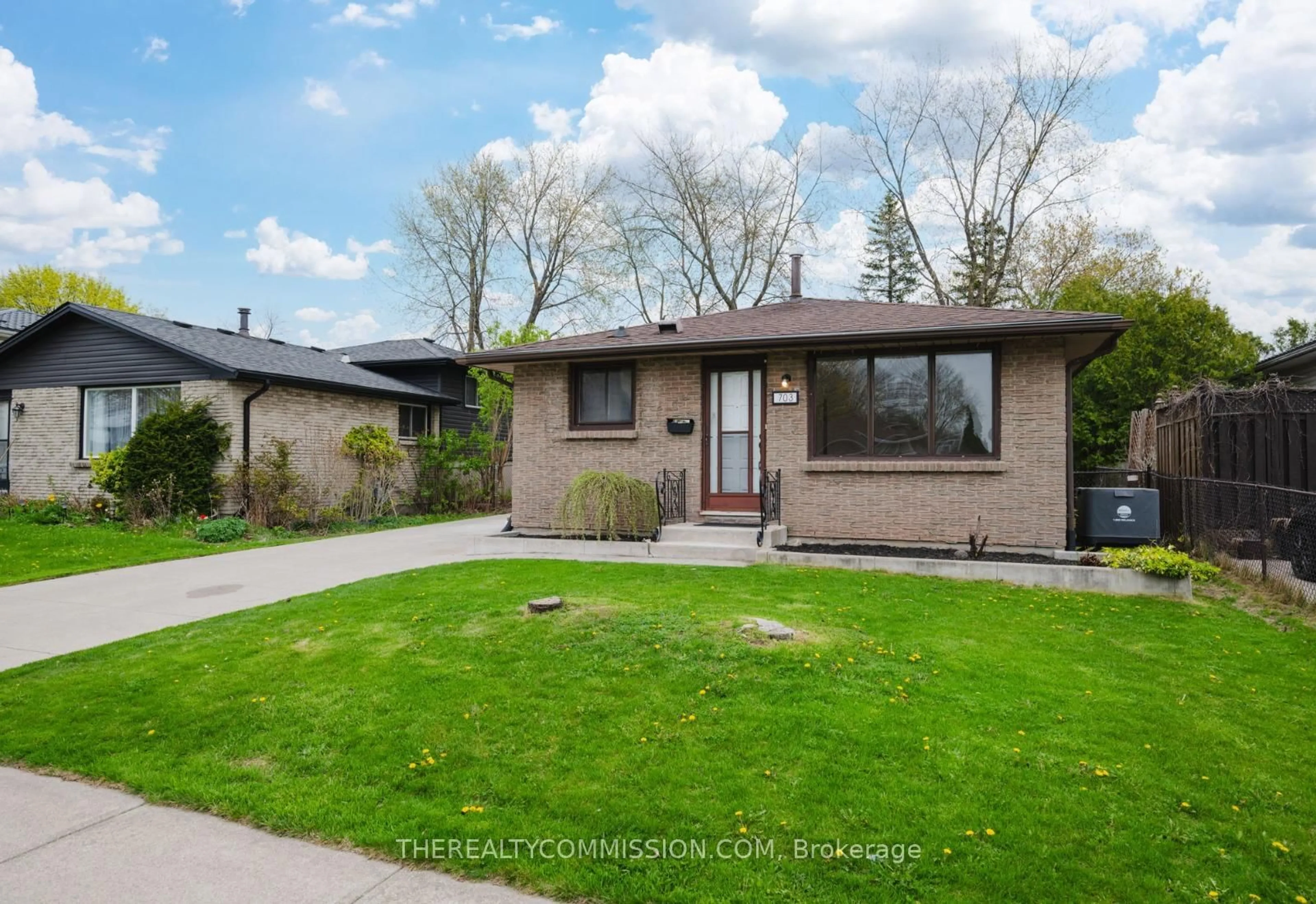 Home with brick exterior material, street for 703 Millbank Dr, London South Ontario N6E 1Y7