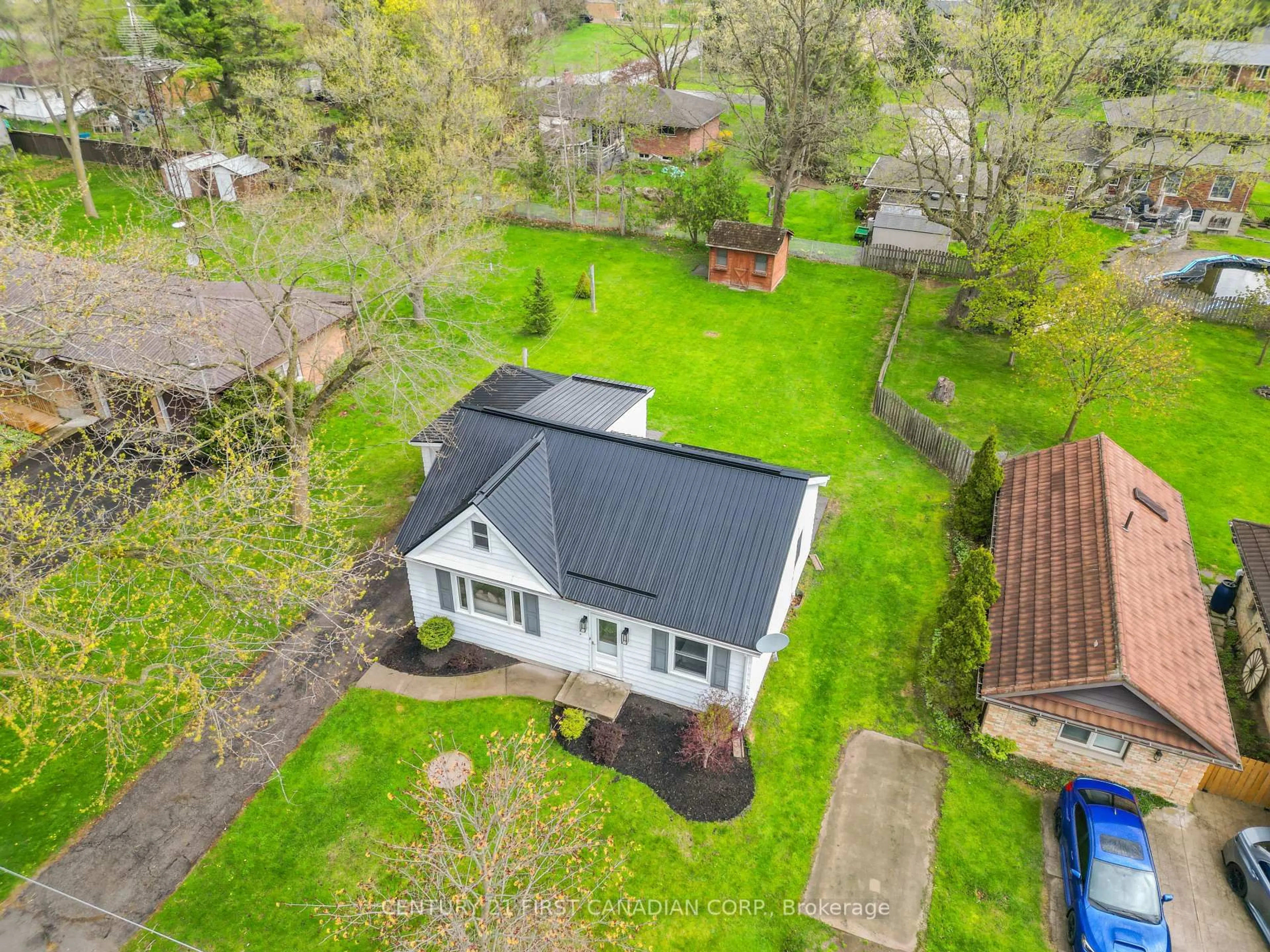 A pic from outside/outdoor area/front of a property/back of a property/a pic from drone, unknown for 24342 Poplar Hill Rd, Middlesex Centre Ontario N0M 2A0