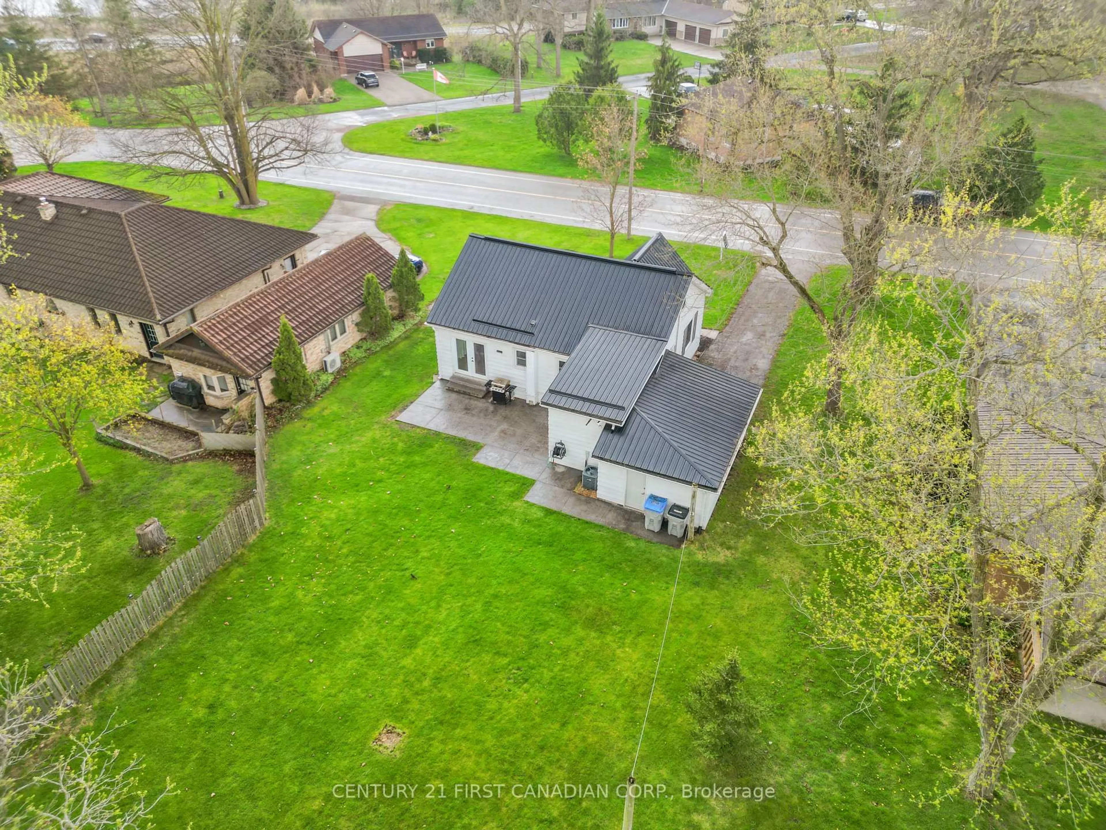A pic from outside/outdoor area/front of a property/back of a property/a pic from drone, street for 24342 Poplar Hill Rd, Middlesex Centre Ontario N0M 2A0
