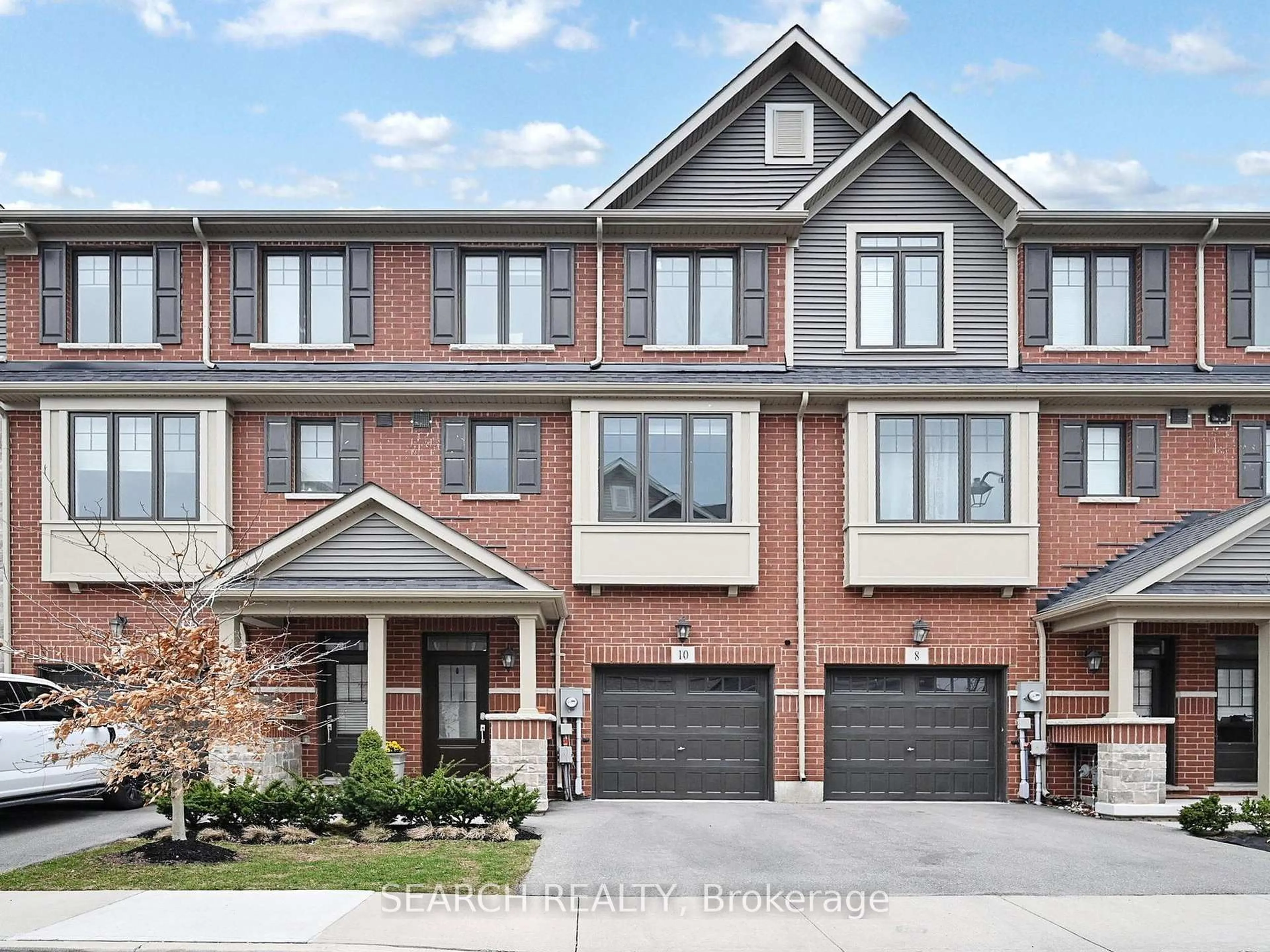 Home with brick exterior material, street for 10 Snowberry Lane, Hamilton Ontario L8K 0A4