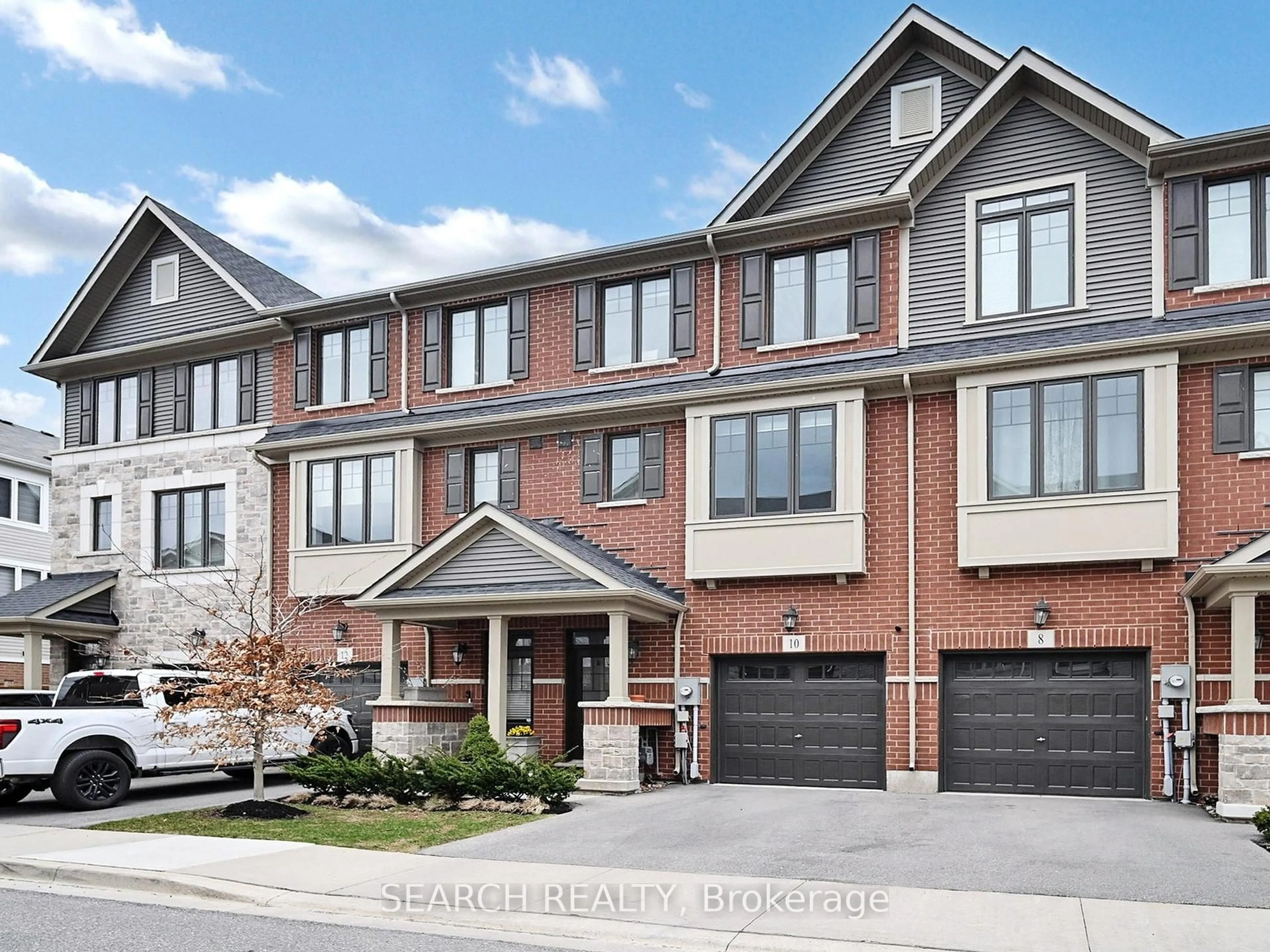 Home with brick exterior material, street for 10 Snowberry Lane, Hamilton Ontario L8K 0A4
