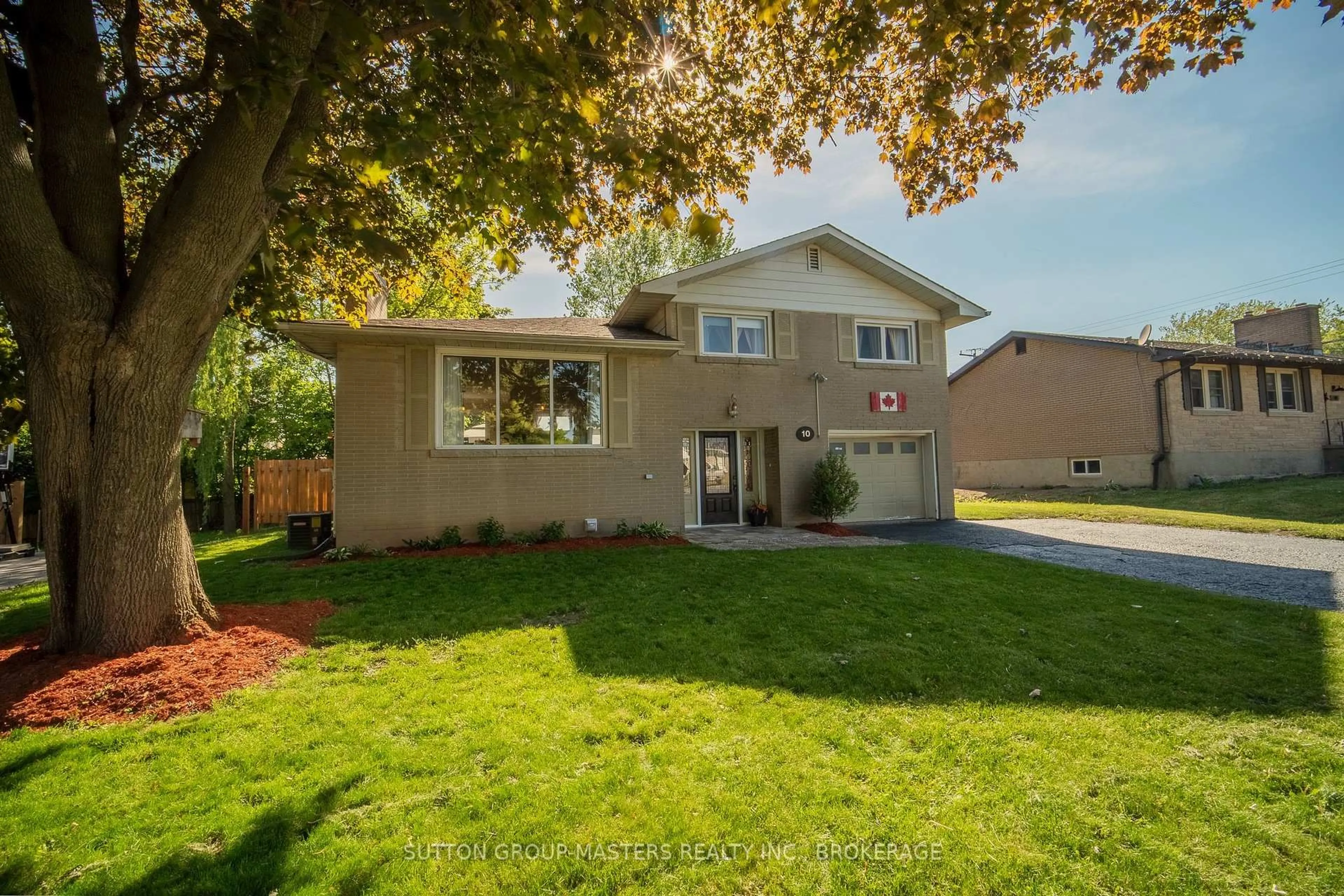Home with vinyl exterior material, street for 10 Westfield Dr, Loyalist Ontario K7N 1M9