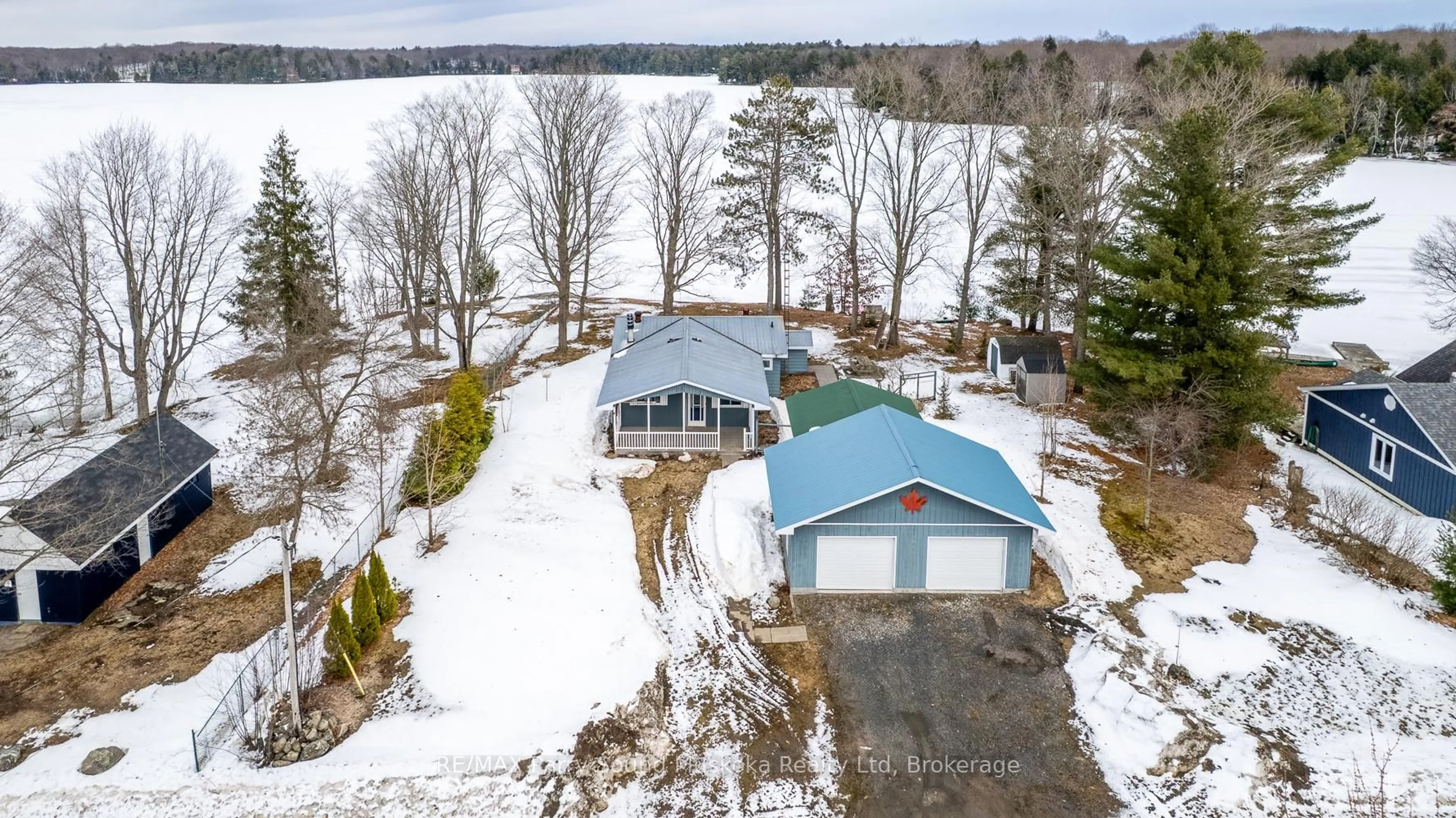 A pic from outside/outdoor area/front of a property/back of a property/a pic from drone, water/lake/river/ocean view for 61 Stewart St, Georgian Bay Ontario P0C 1H0