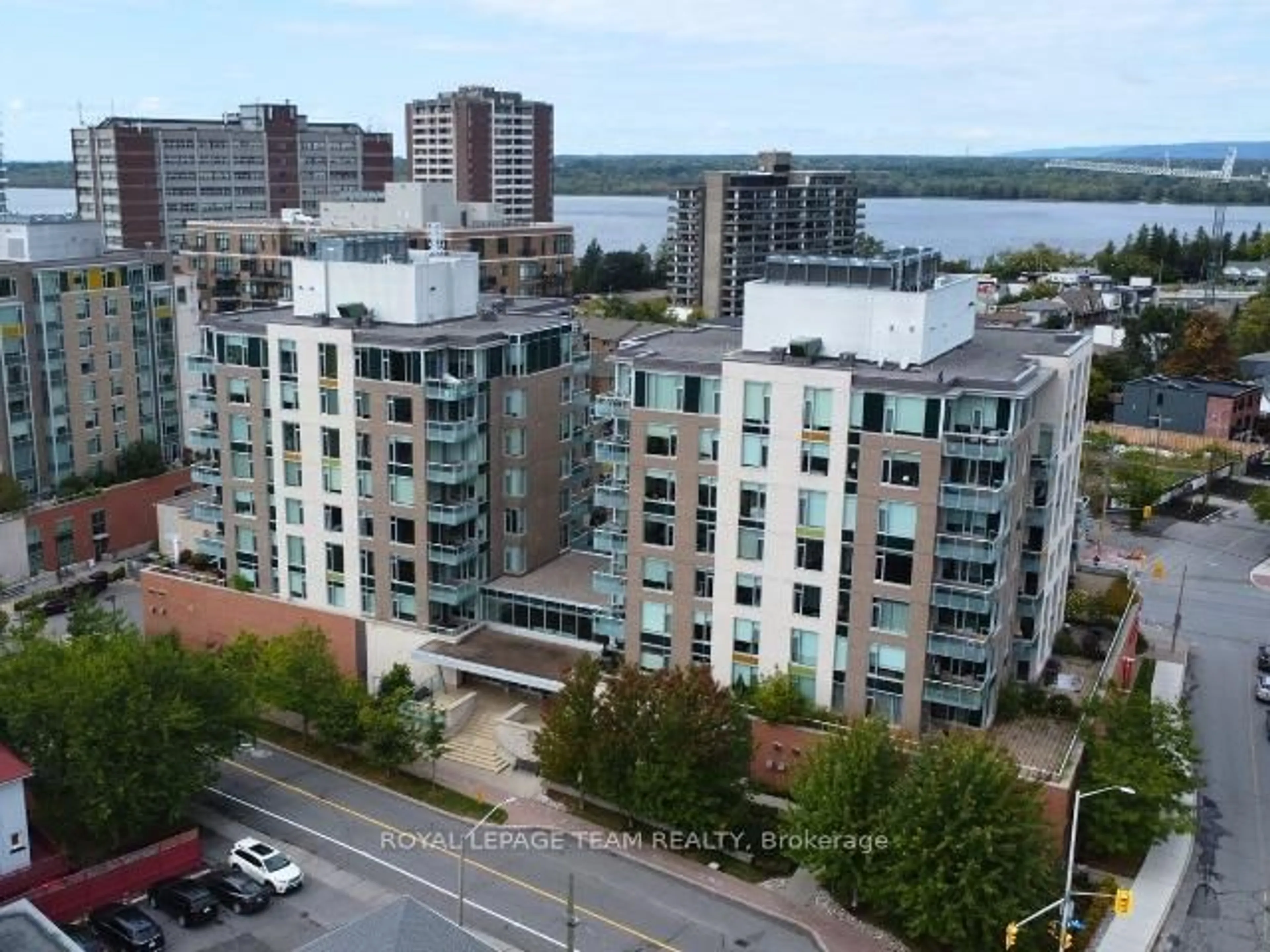 A pic from outside/outdoor area/front of a property/back of a property/a pic from drone, water/lake/river/ocean view for 575 Byron Ave #413, Ottawa Ontario K2A 1R7