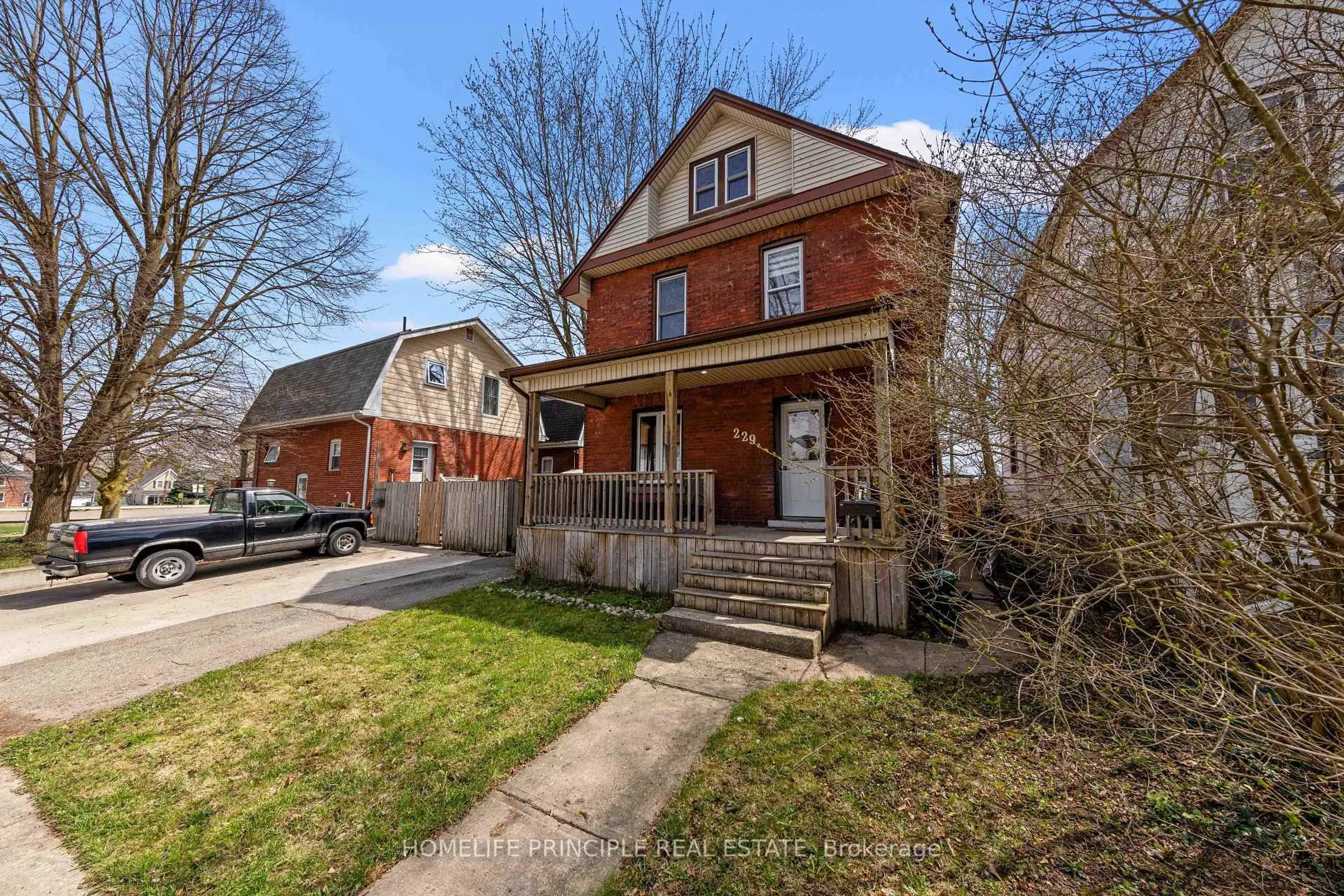 Home with brick exterior material, street for 229 Nile St, Stratford Ontario N5A 4G1