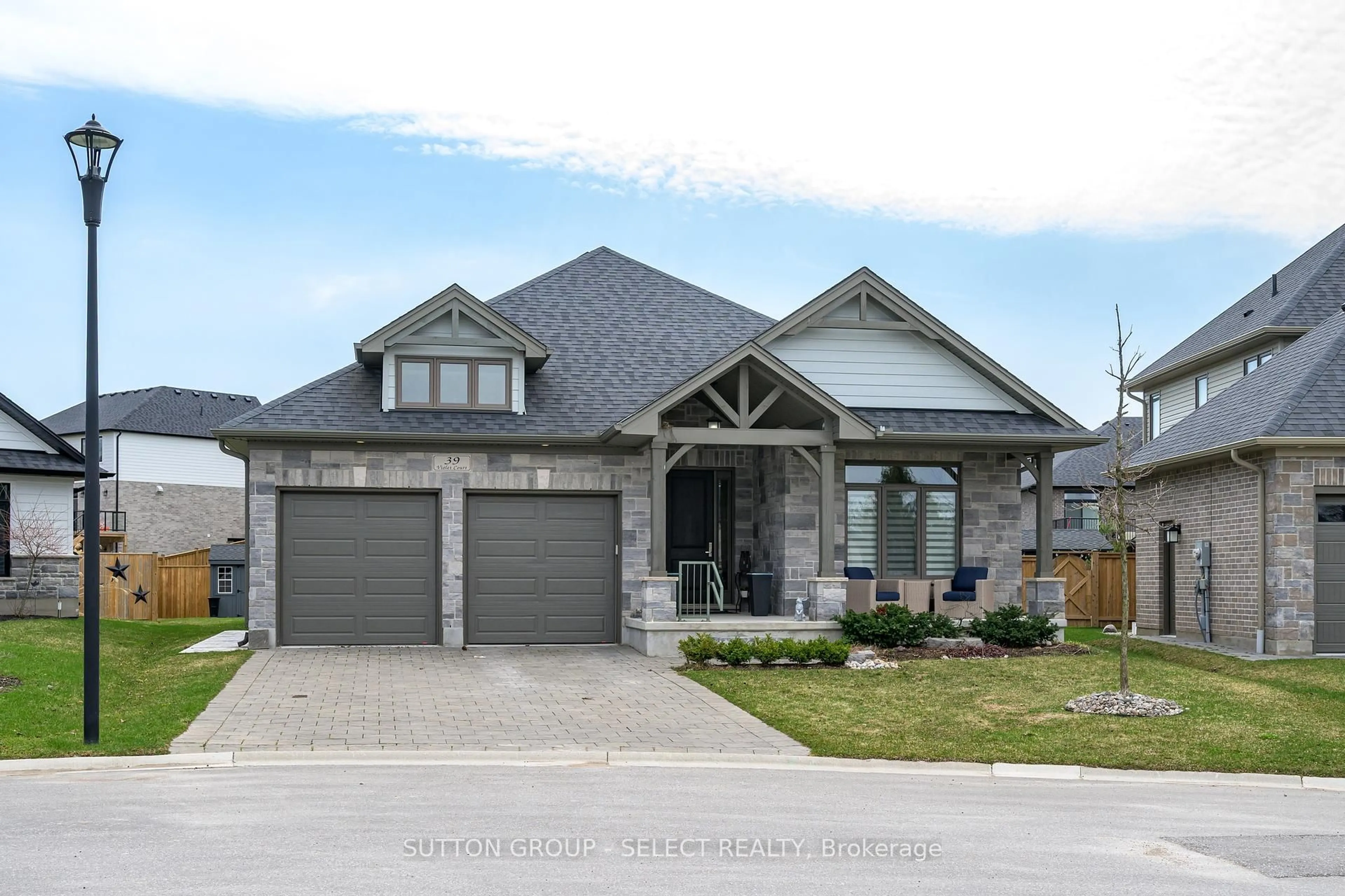 Home with brick exterior material, street for 39 Violet Crt, Middlesex Centre Ontario N0M 2A0