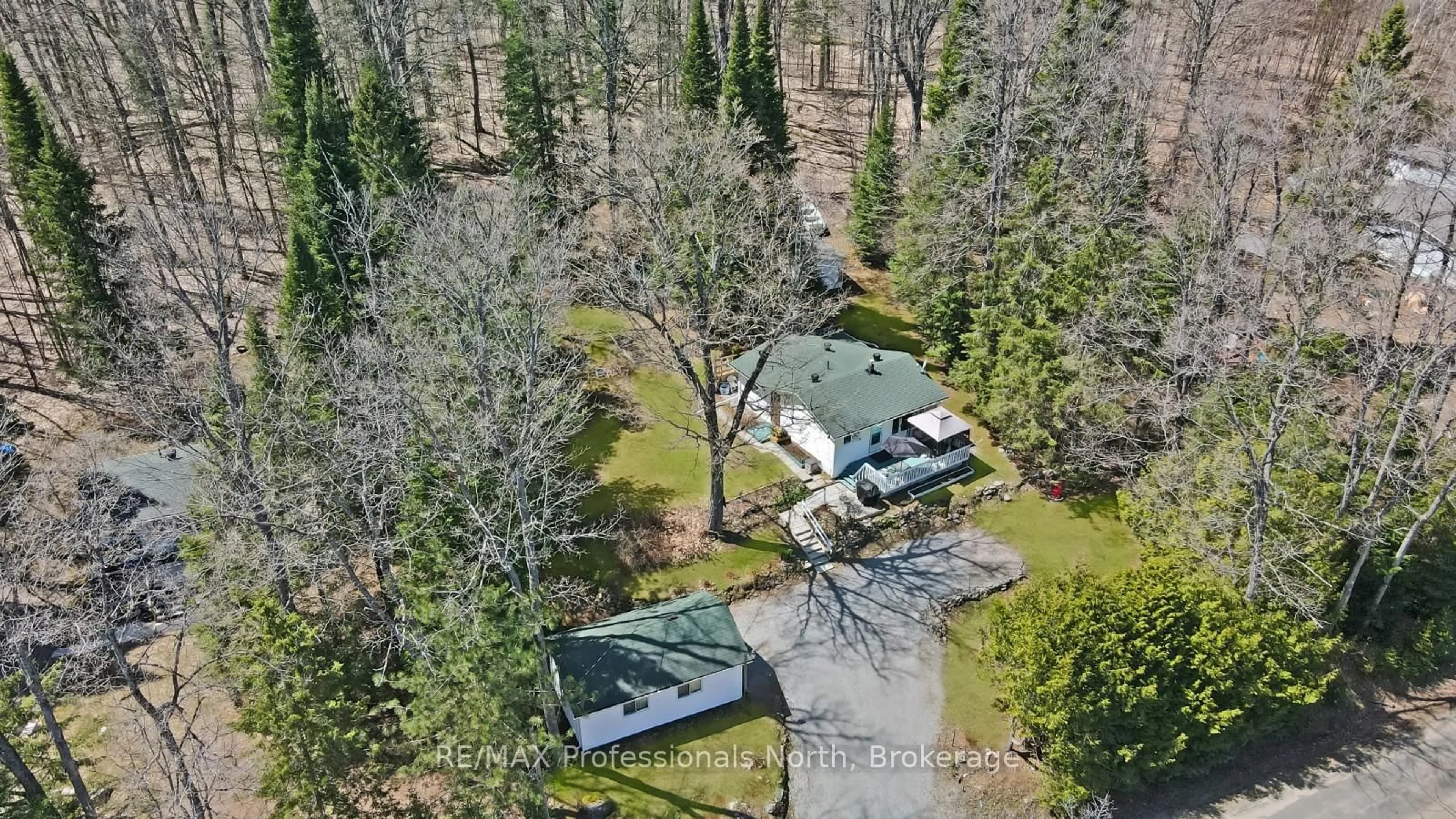 A pic from outside/outdoor area/front of a property/back of a property/a pic from drone, forest/trees view for 1039 Grace River Rd, Highlands East Ontario K0L 3C0