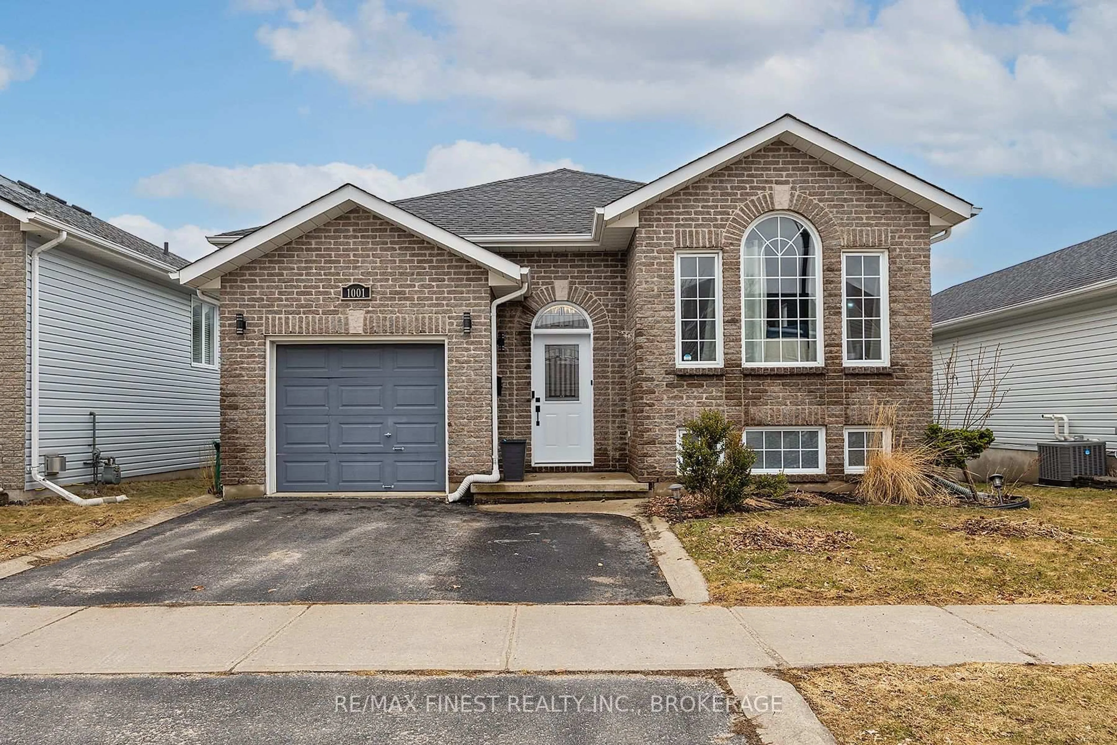 Home with brick exterior material, street for 1001 Bluffwood Ave, Kingston Ontario K7K 7K6