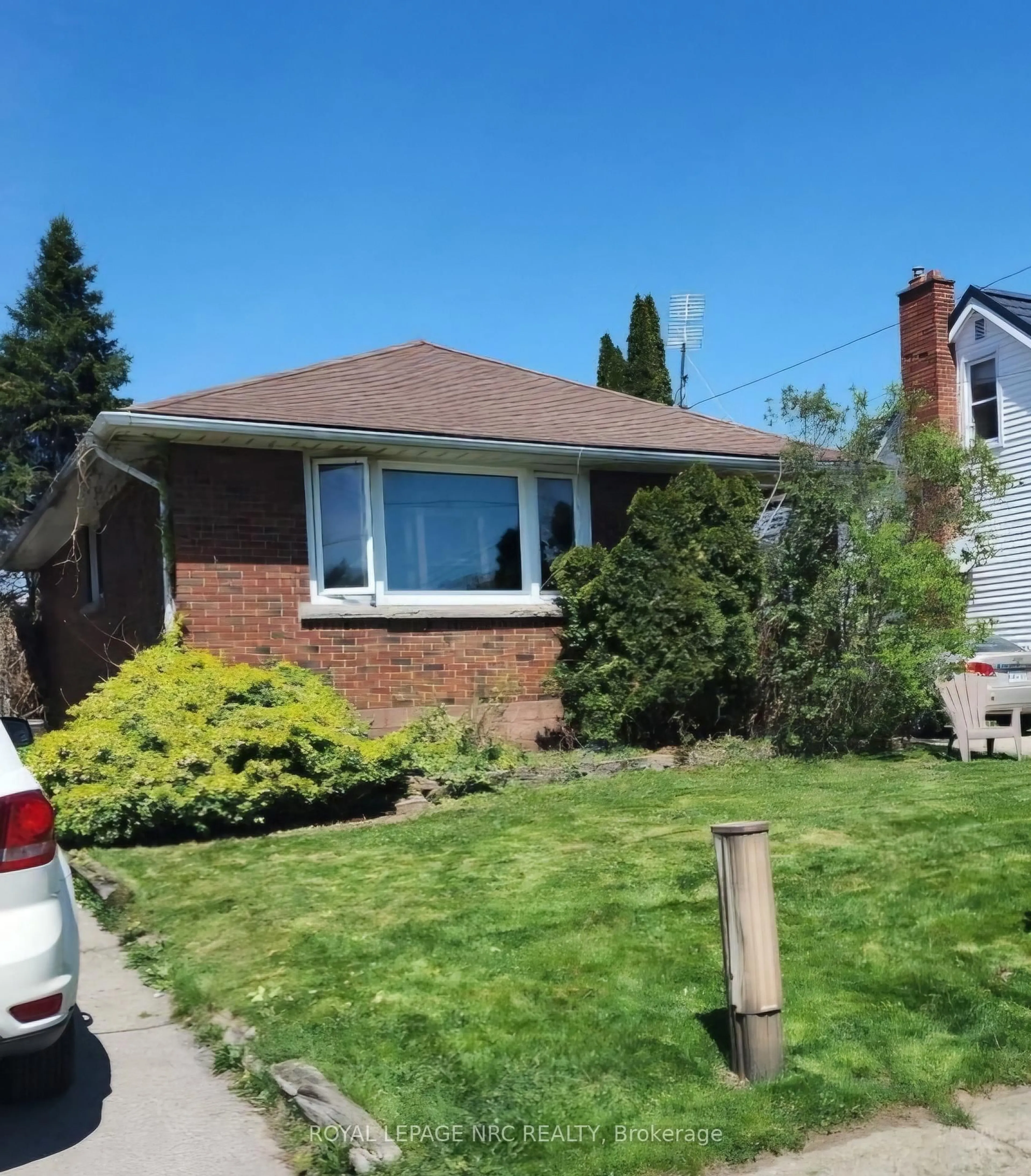 Home with brick exterior material, street for 6483 Monroe St, Niagara Falls Ontario L2G 2G9