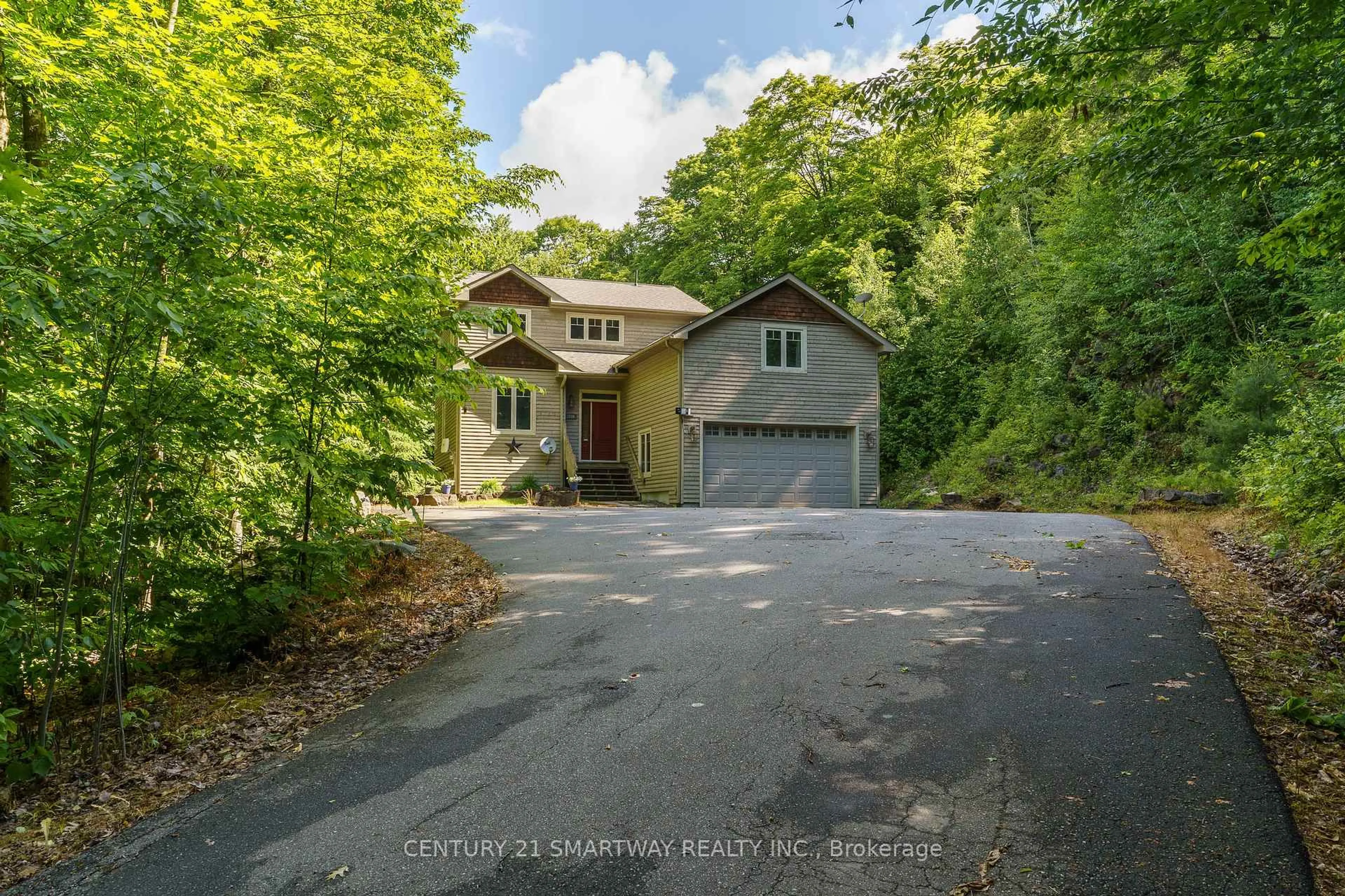 A pic from outside/outdoor area/front of a property/back of a property/a pic from drone, street for 1066 Tally-Ho Winter Park Rd, Lake of Bays Ontario P1H 2J6