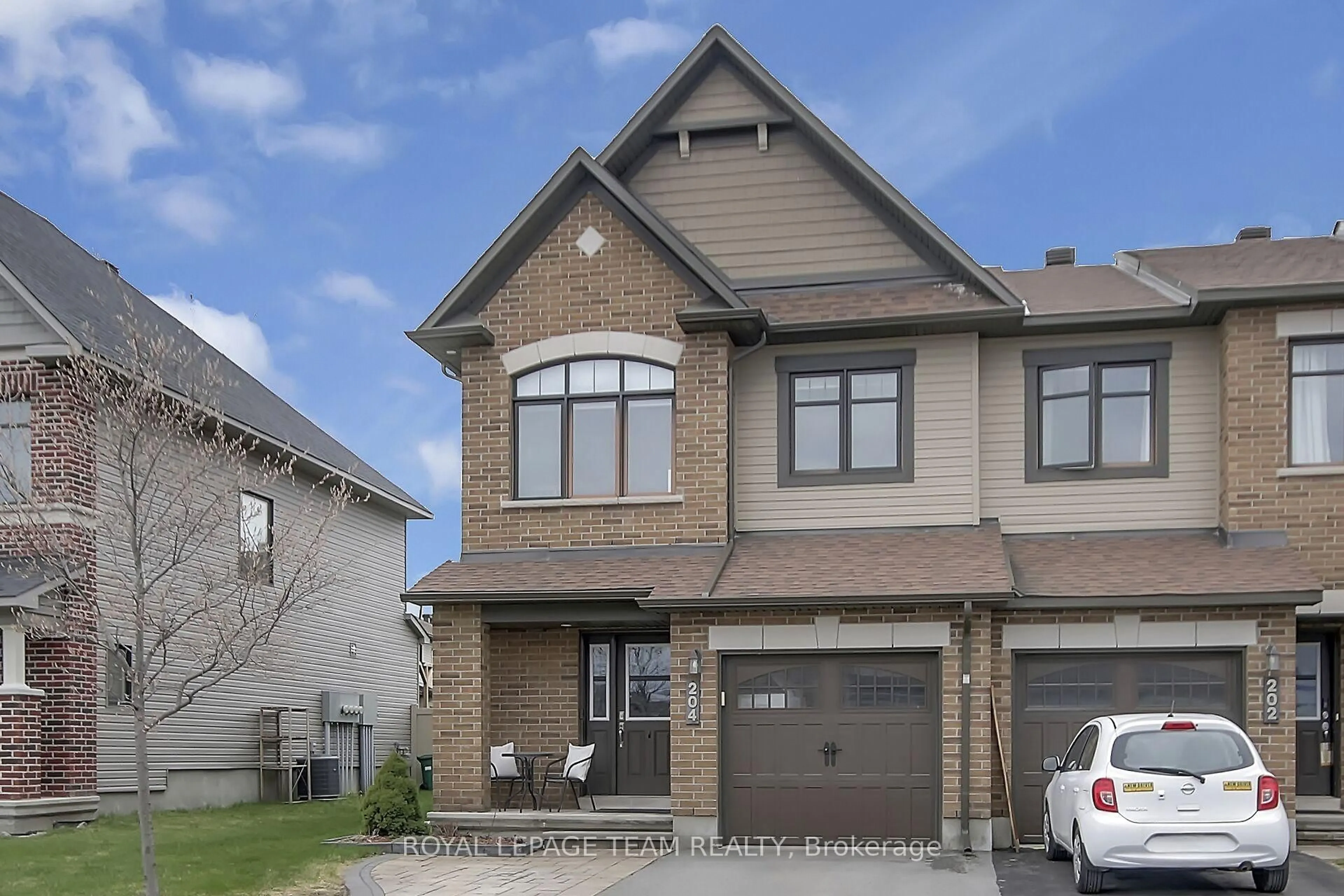 Home with brick exterior material, street for 204 Clonrush Way, Ottawa Ontario K2T 0K7