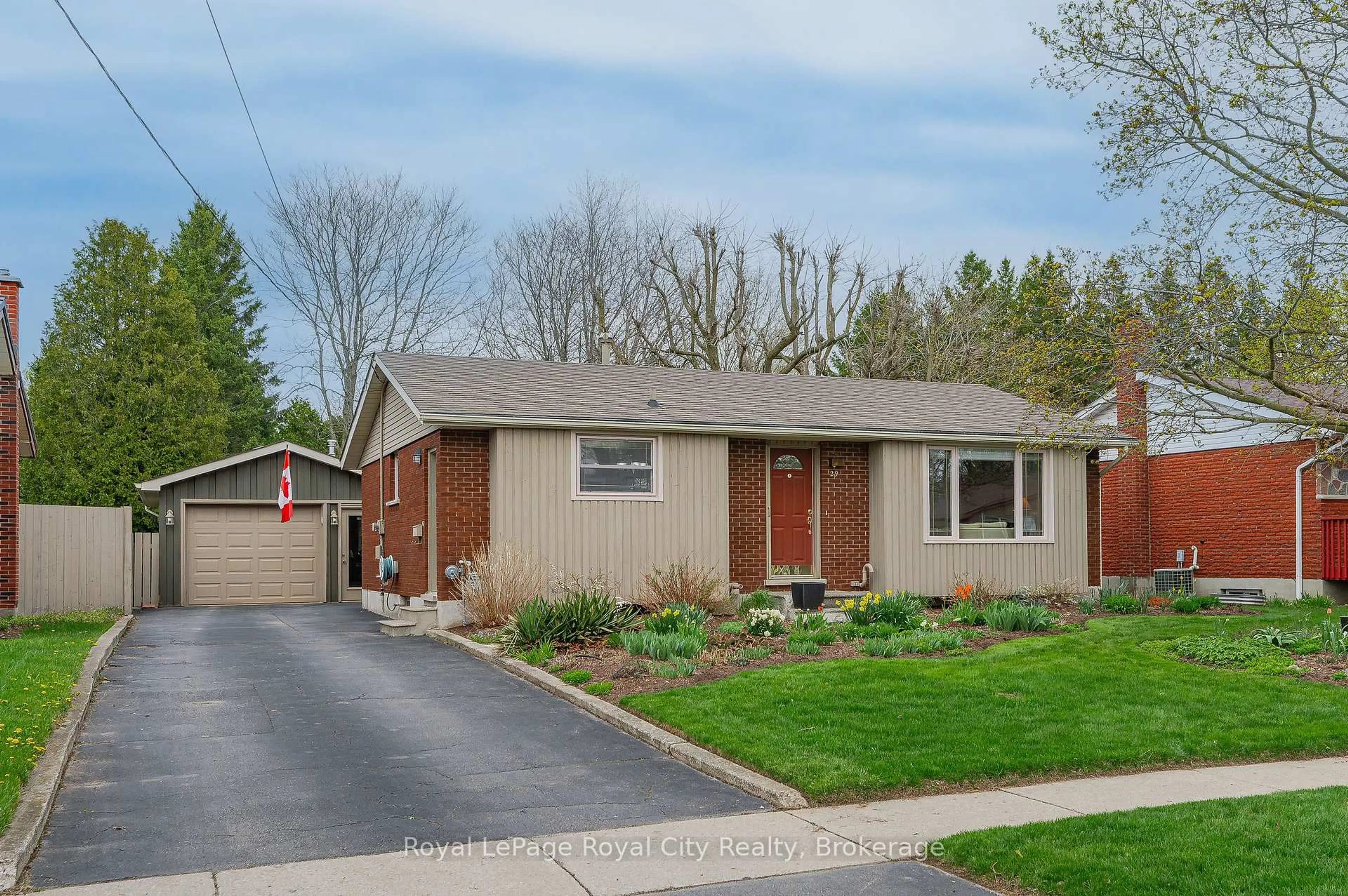 Home with vinyl exterior material, street for 29 Hastings Blvd, Guelph Ontario N1E 4G3