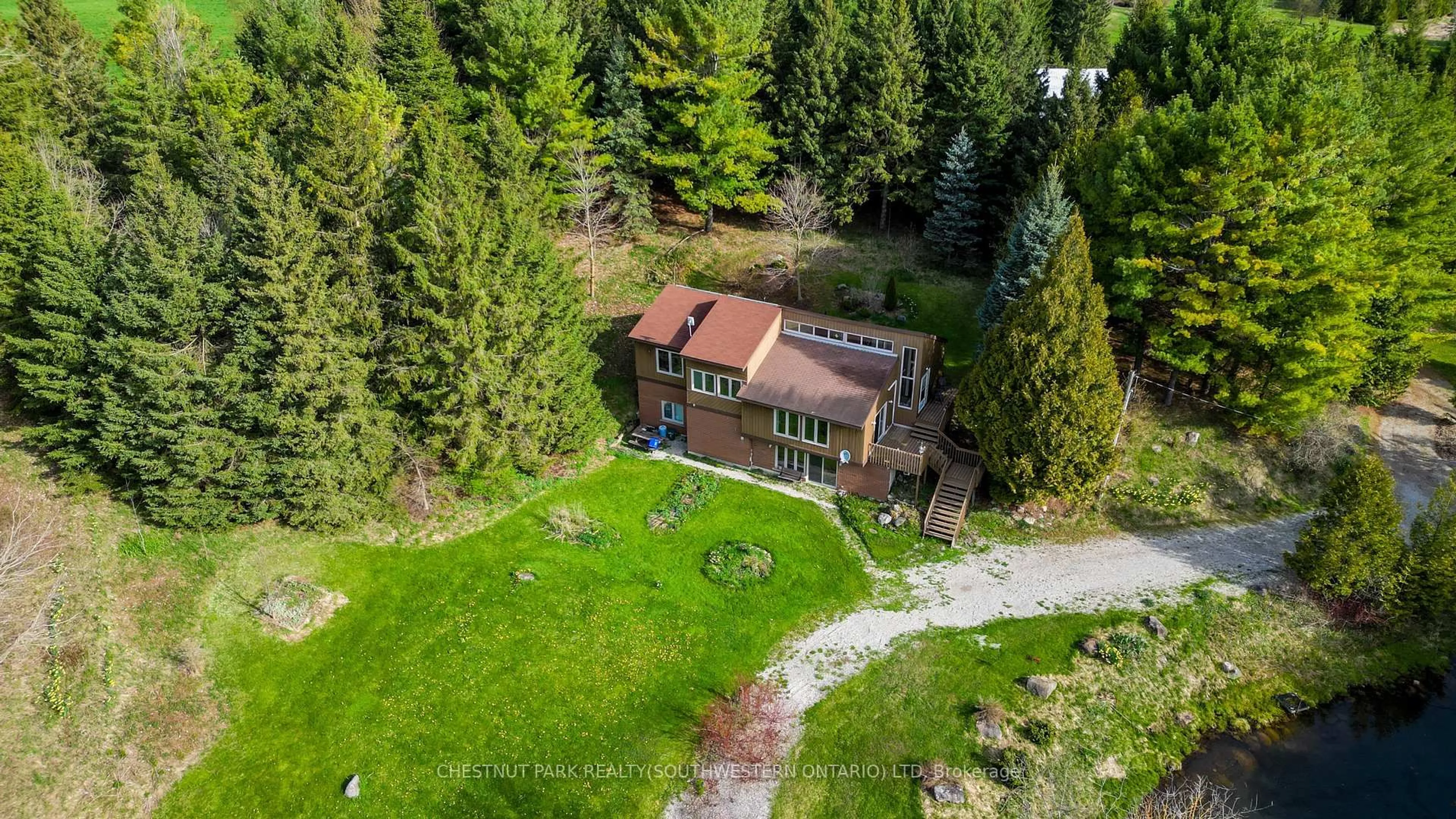 A pic from outside/outdoor area/front of a property/back of a property/a pic from drone, forest/trees view for 2060 Moser-Young Rd, Wellesley Ontario N0B 2T0