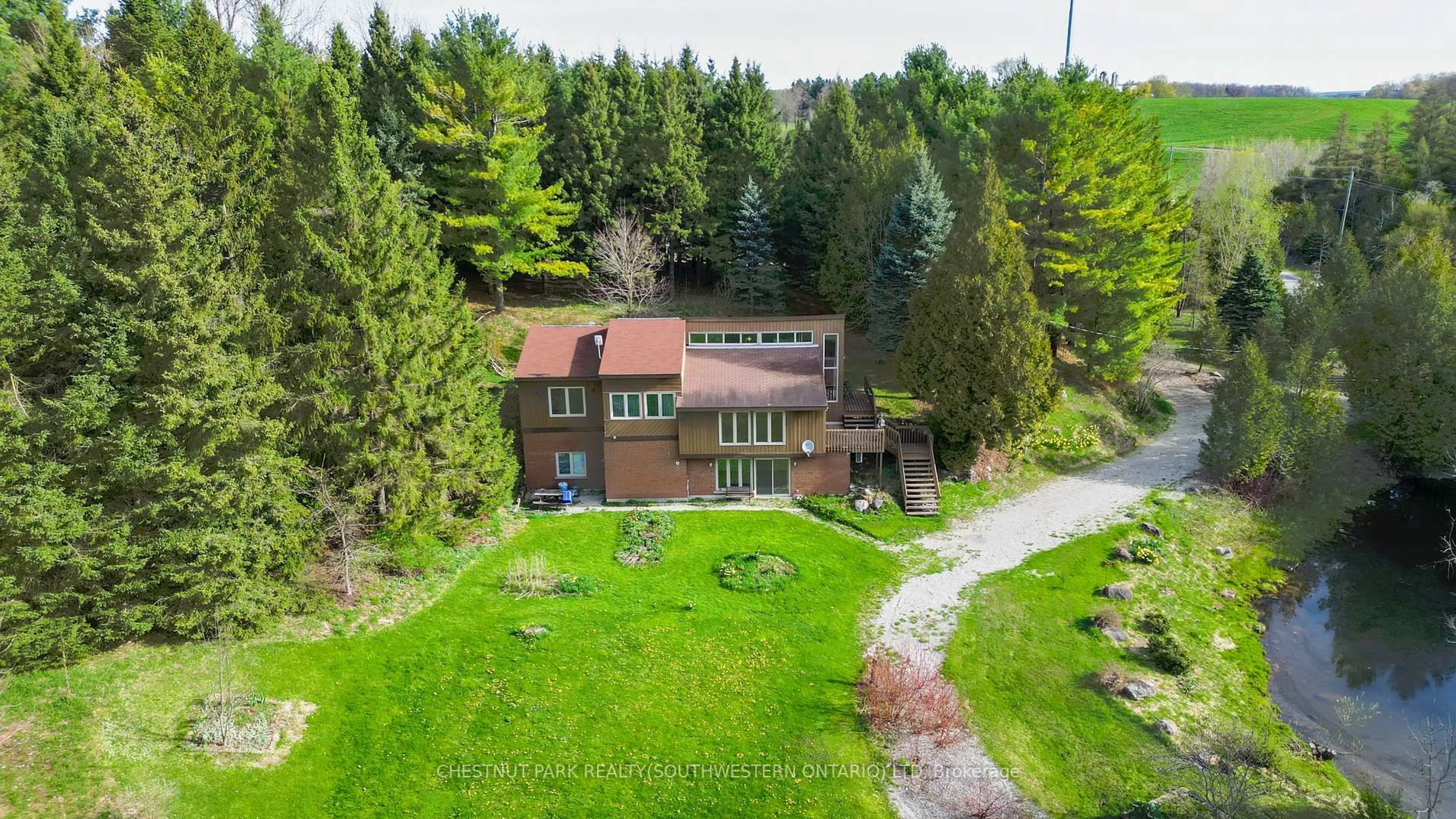 A pic from outside/outdoor area/front of a property/back of a property/a pic from drone, unknown for 2060 Moser-Young Rd, Wellesley Ontario N0B 2T0