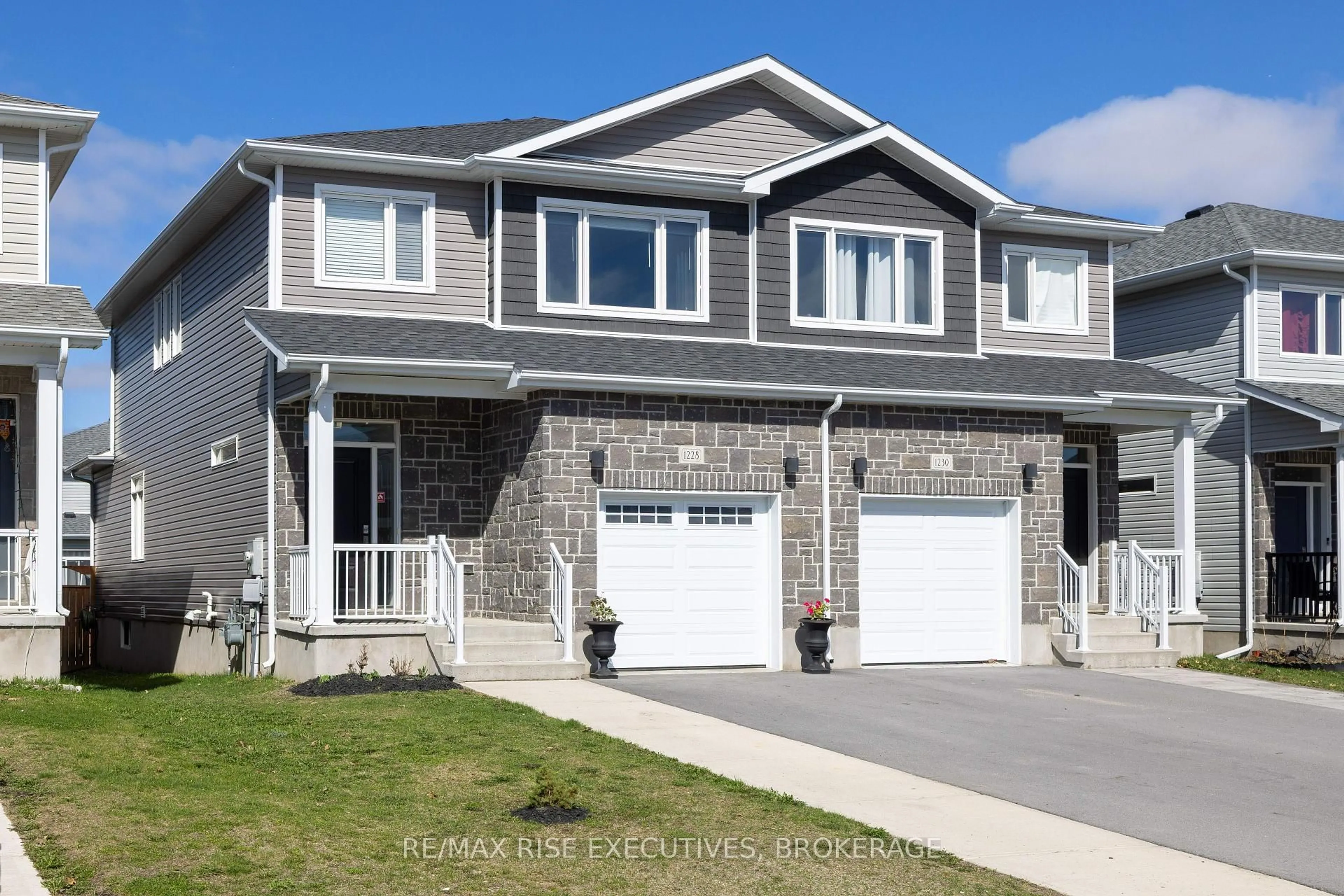 Home with vinyl exterior material, street for 1228 Max Cres, Kingston Ontario K7P 0P3