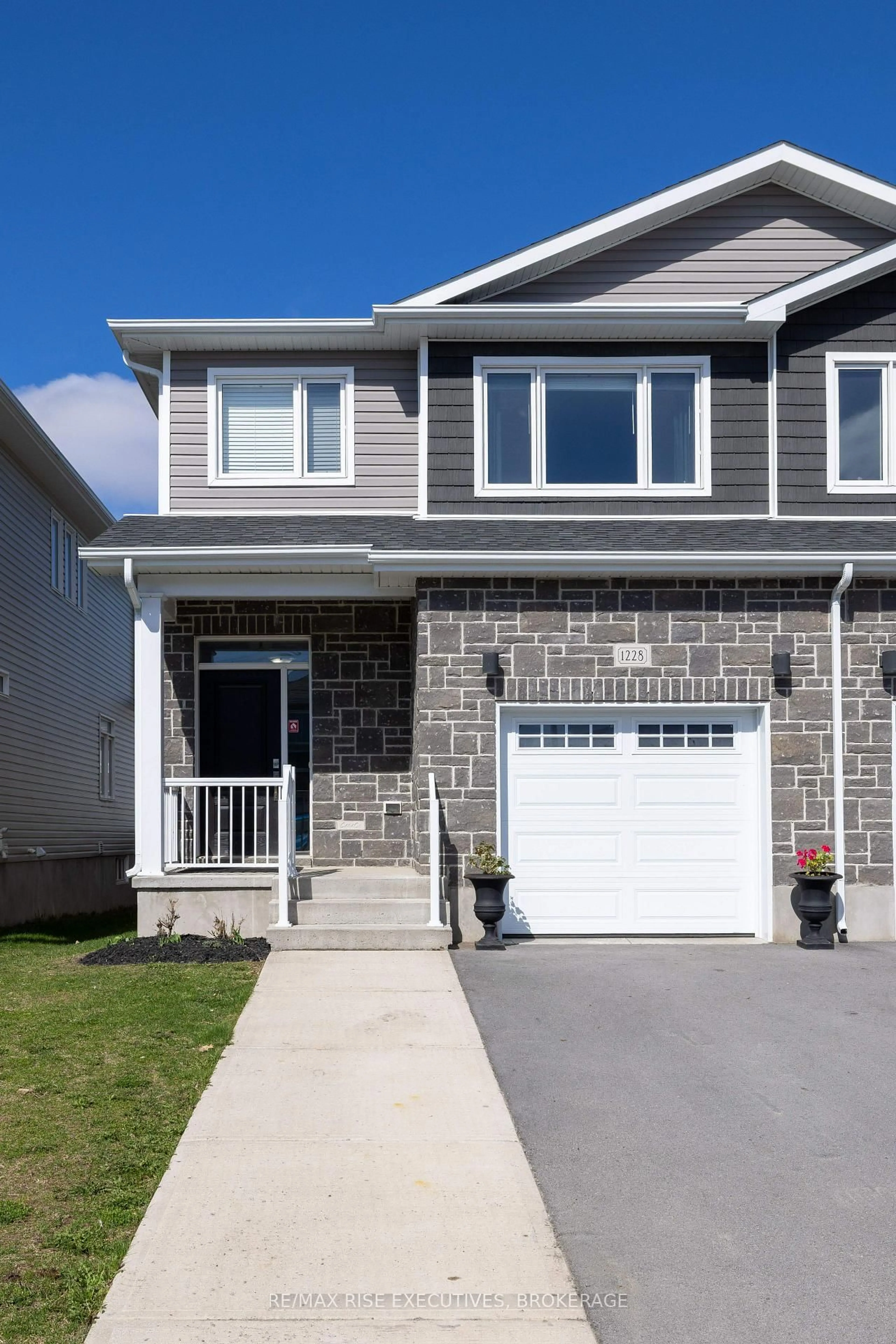 Home with vinyl exterior material, street for 1228 Max Cres, Kingston Ontario K7P 0P3