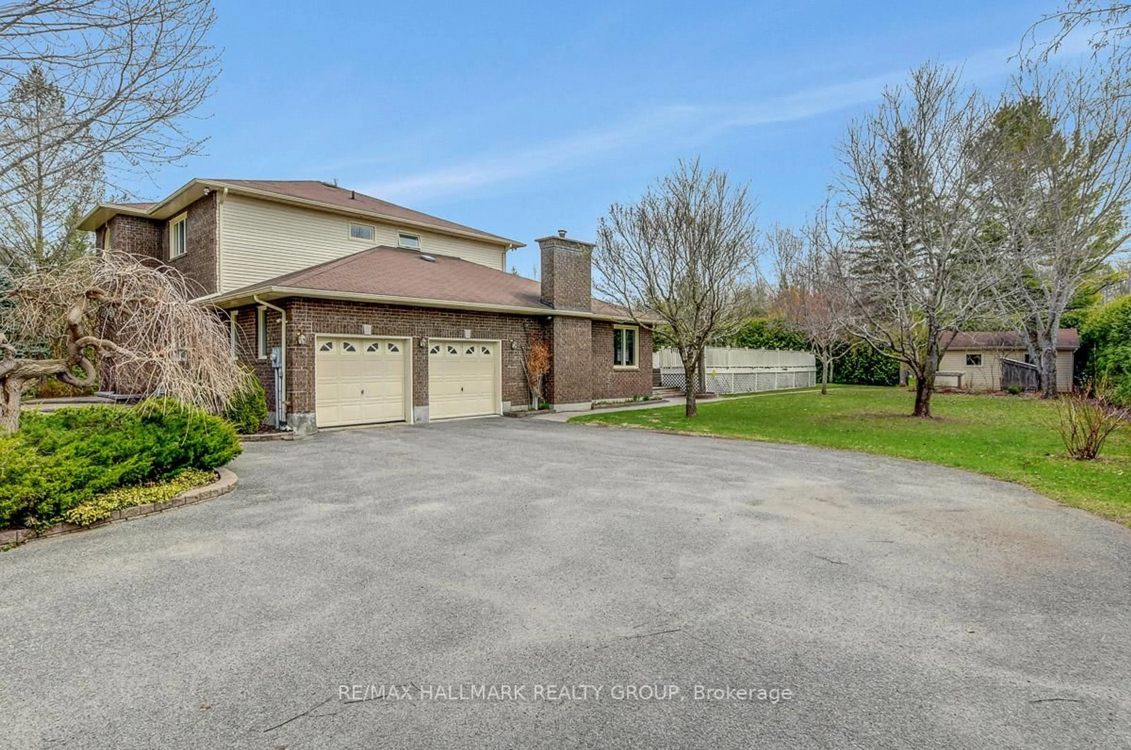 A pic from outside/outdoor area/front of a property/back of a property/a pic from drone, water/lake/river/ocean view for 111 Huntley Manor Dr, Carp Ontario K0A 1L0