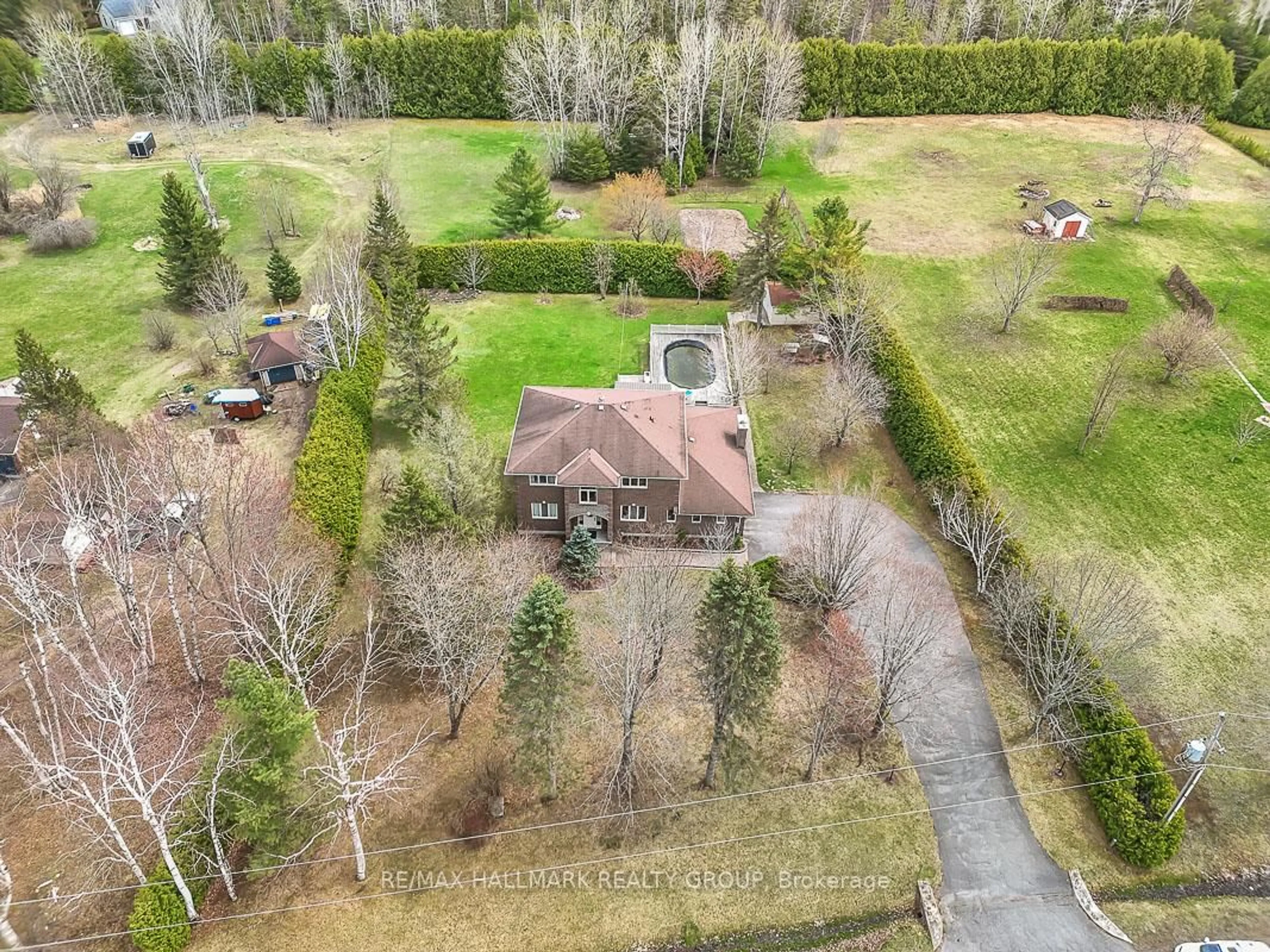 A pic from outside/outdoor area/front of a property/back of a property/a pic from drone, unknown for 111 Huntley Manor Dr, Carp Ontario K0A 1L0
