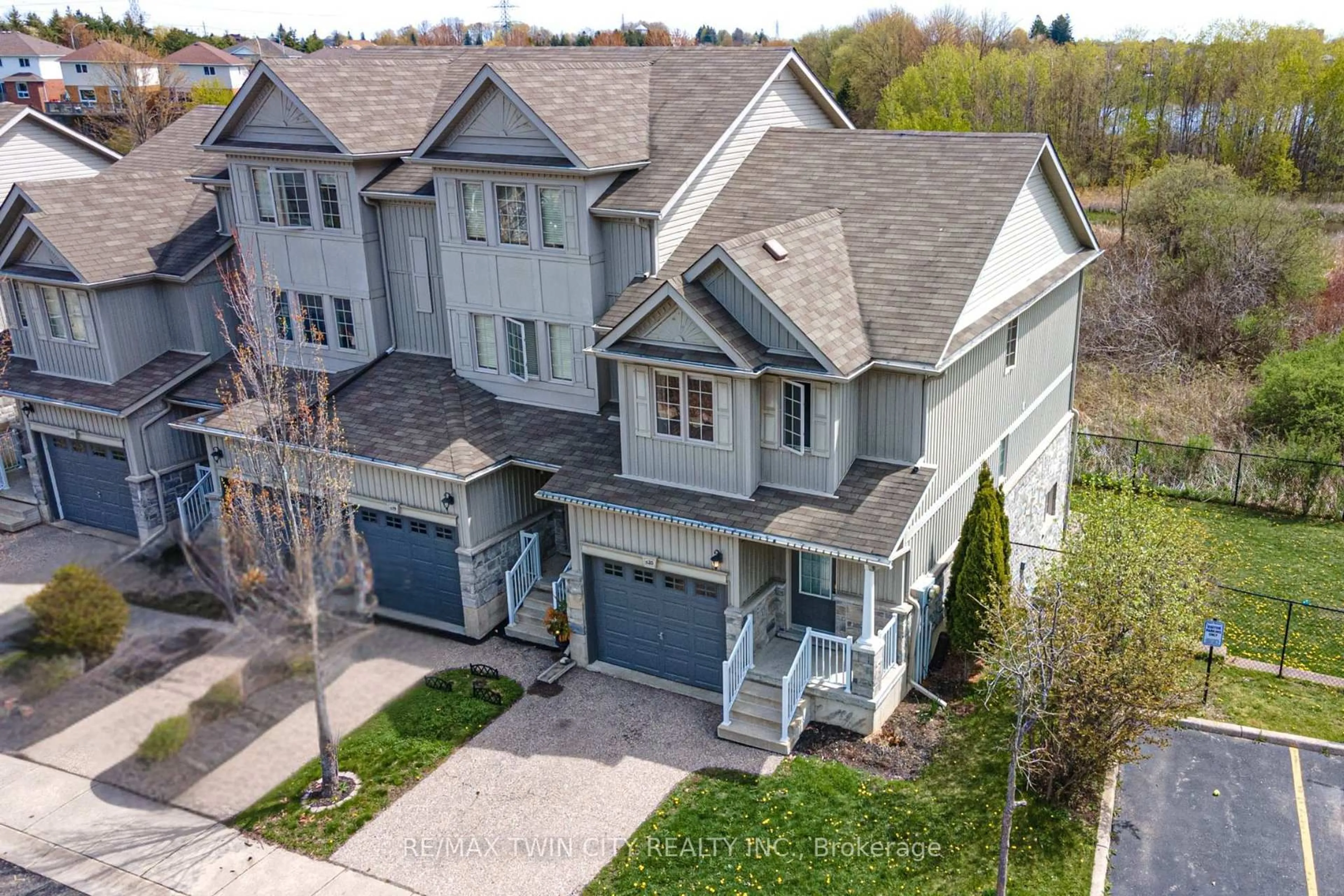 A pic from outside/outdoor area/front of a property/back of a property/a pic from drone, street for 20 David Bergey Dr #C20, Kitchener Ontario N2E 0B1
