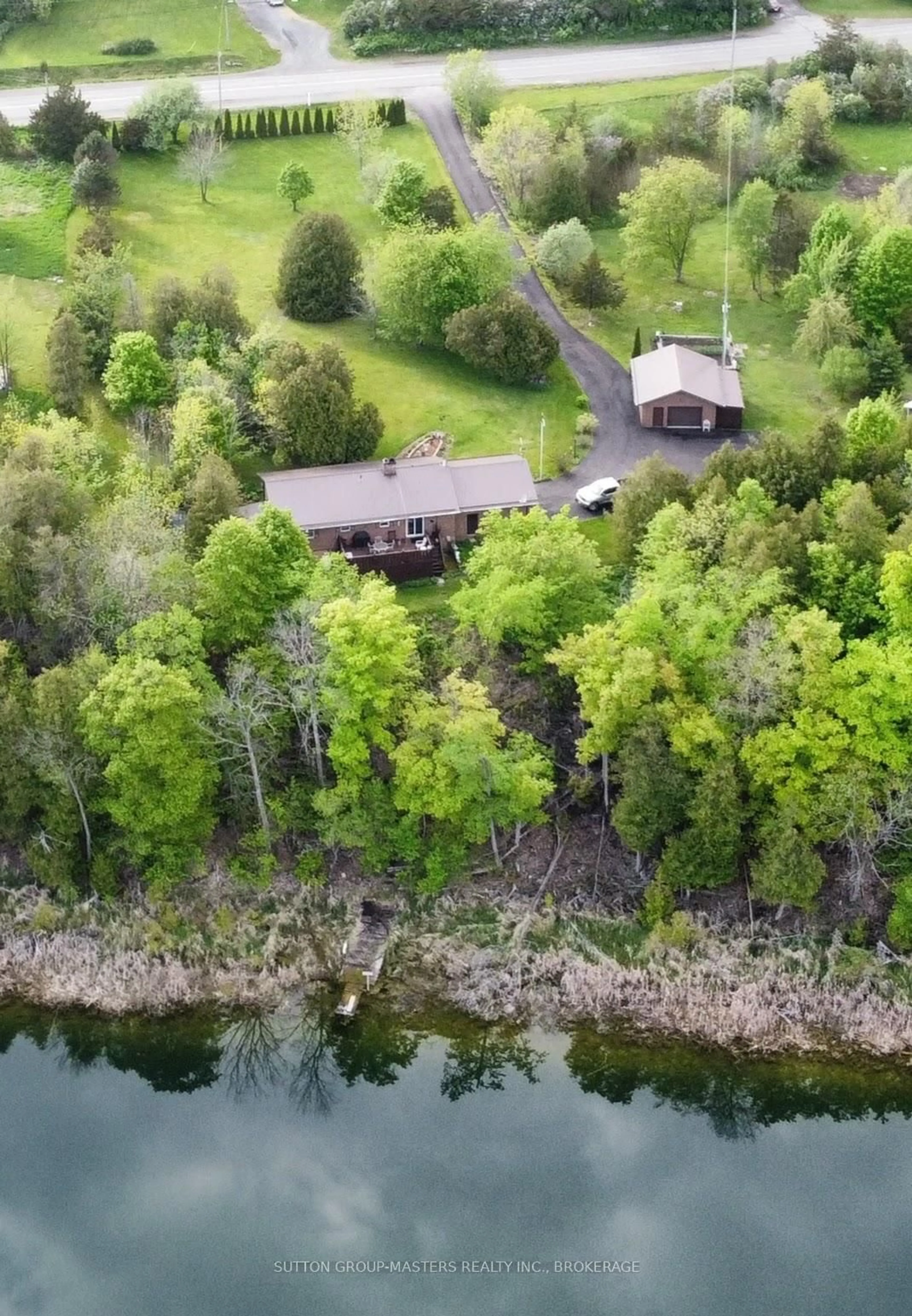 A pic from outside/outdoor area/front of a property/back of a property/a pic from drone, water/lake/river/ocean view for 4822 BATTERSEA Rd, Battersea Ontario K0H 1H0