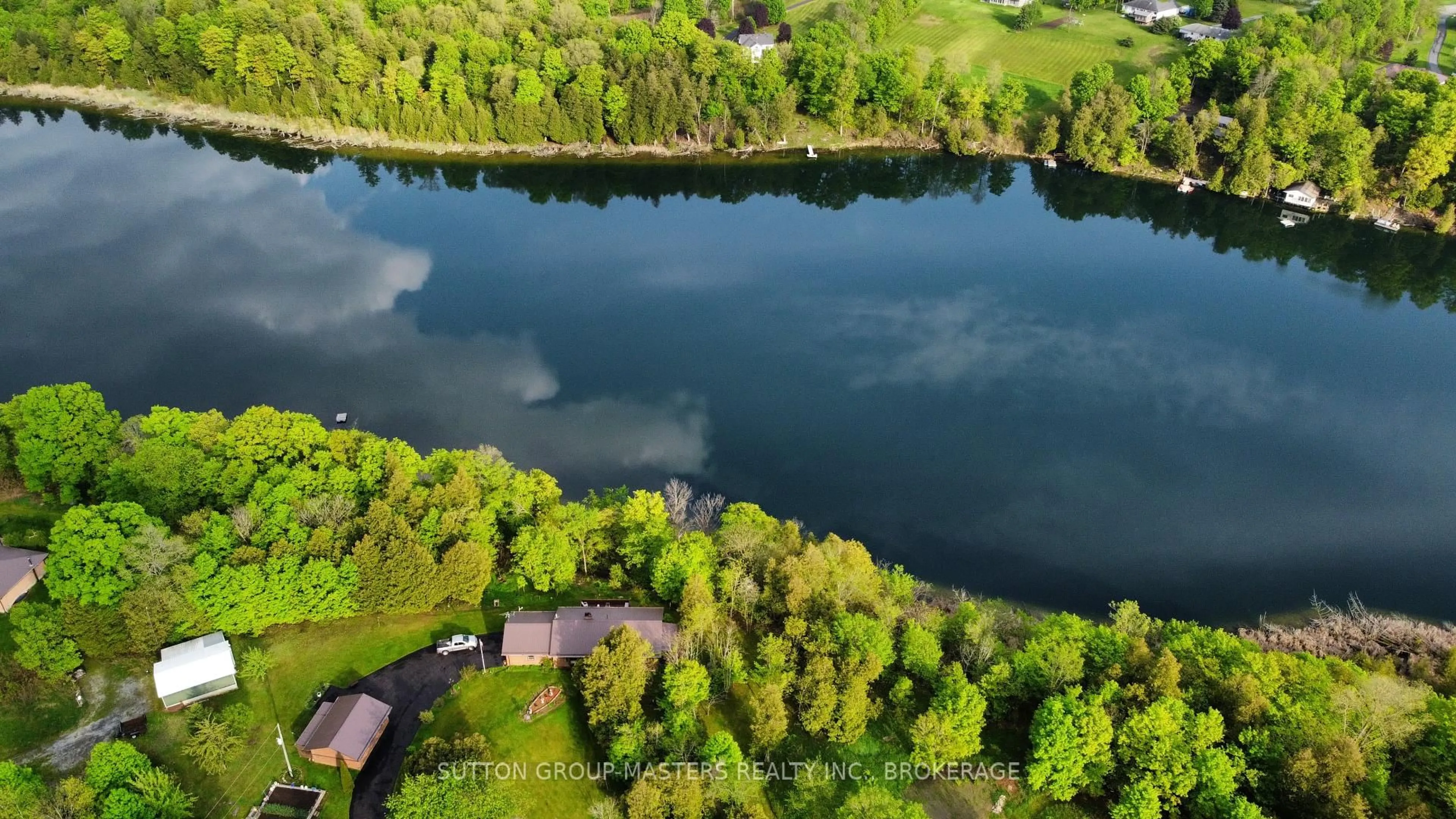A pic from outside/outdoor area/front of a property/back of a property/a pic from drone, water/lake/river/ocean view for 4822 BATTERSEA Rd, Battersea Ontario K0H 1H0