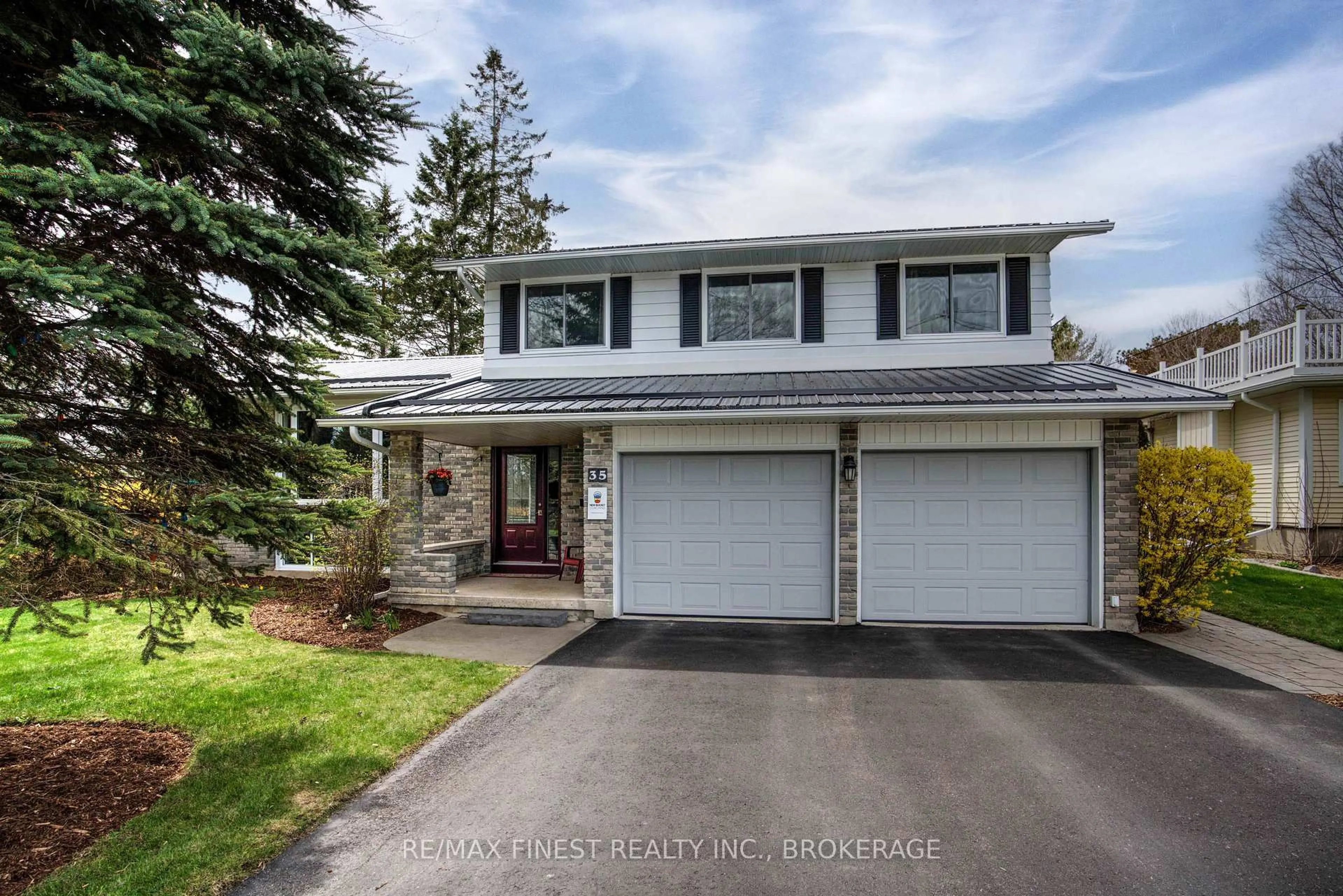 Home with vinyl exterior material, street for 35 Crerar Blvd, Kingston Ontario K7M 3P7